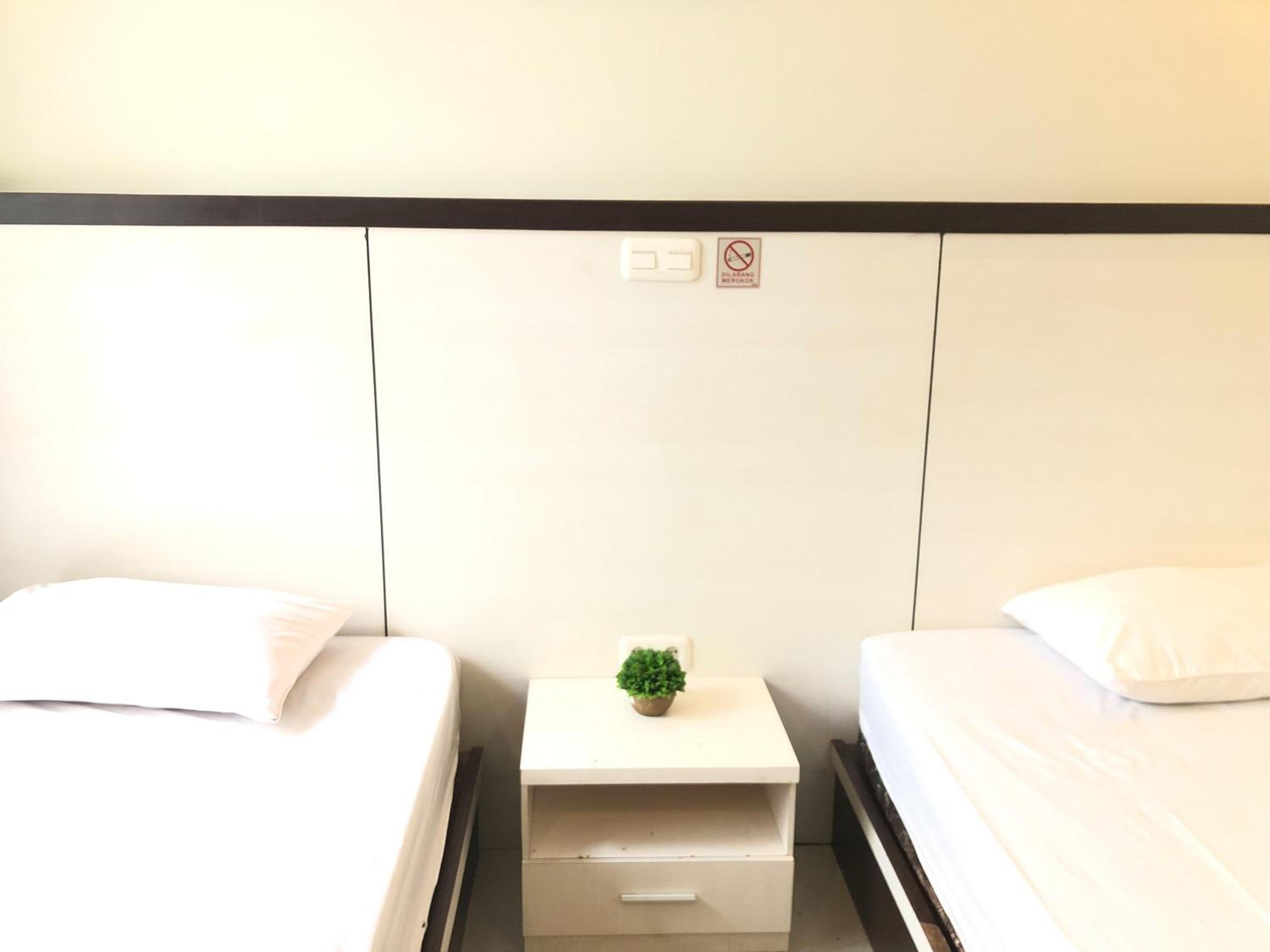 Standard Twin Room - Photo 9