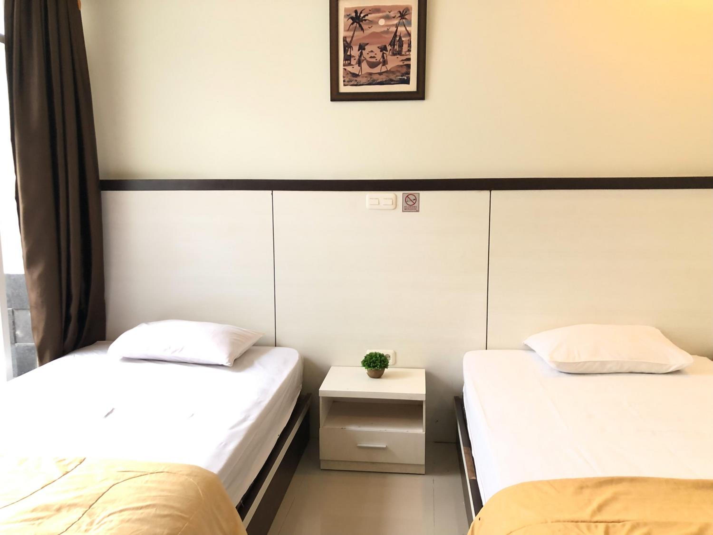 Standard Twin Room - Photo 7