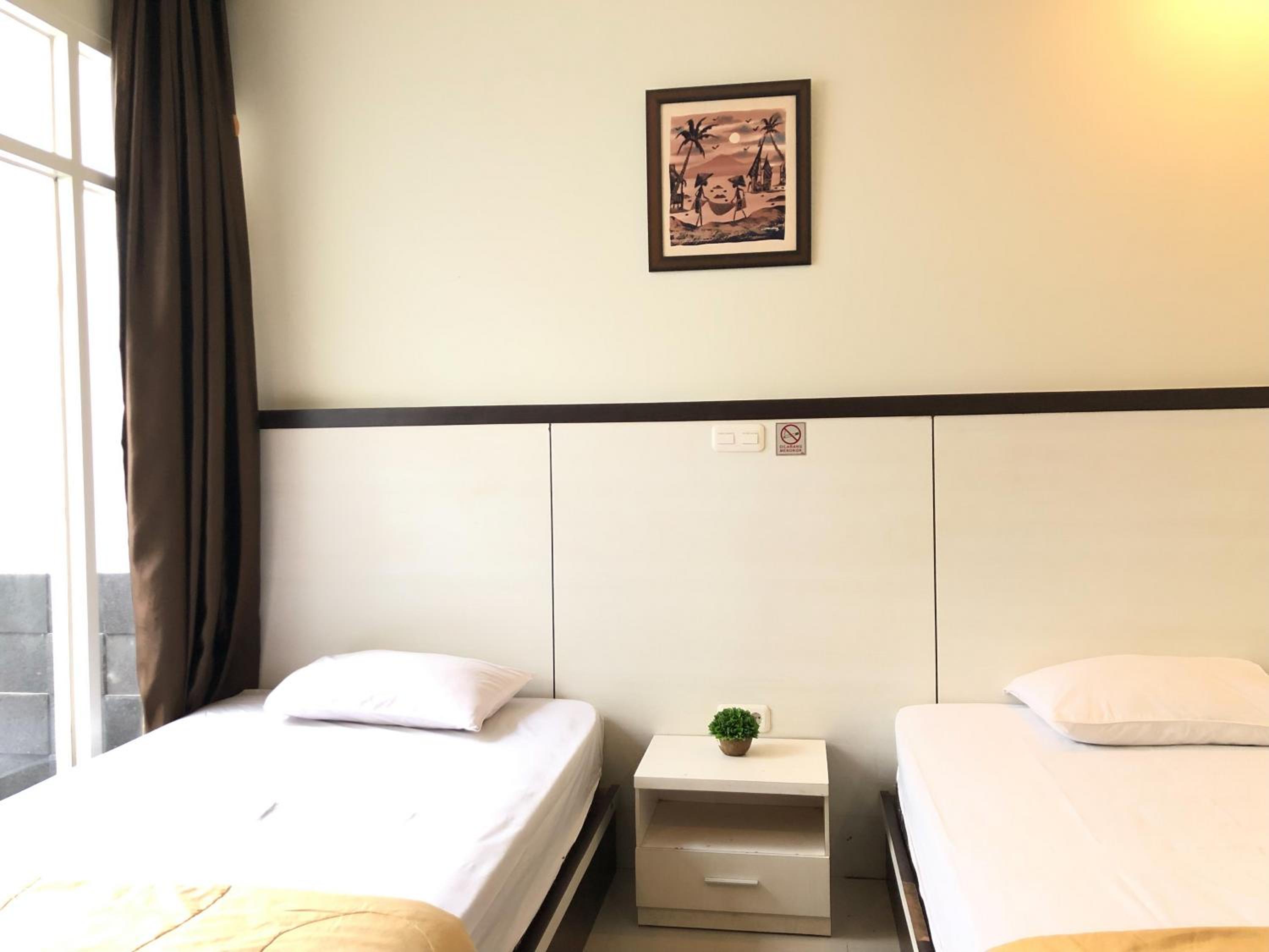 Standard Twin Room - Photo 6