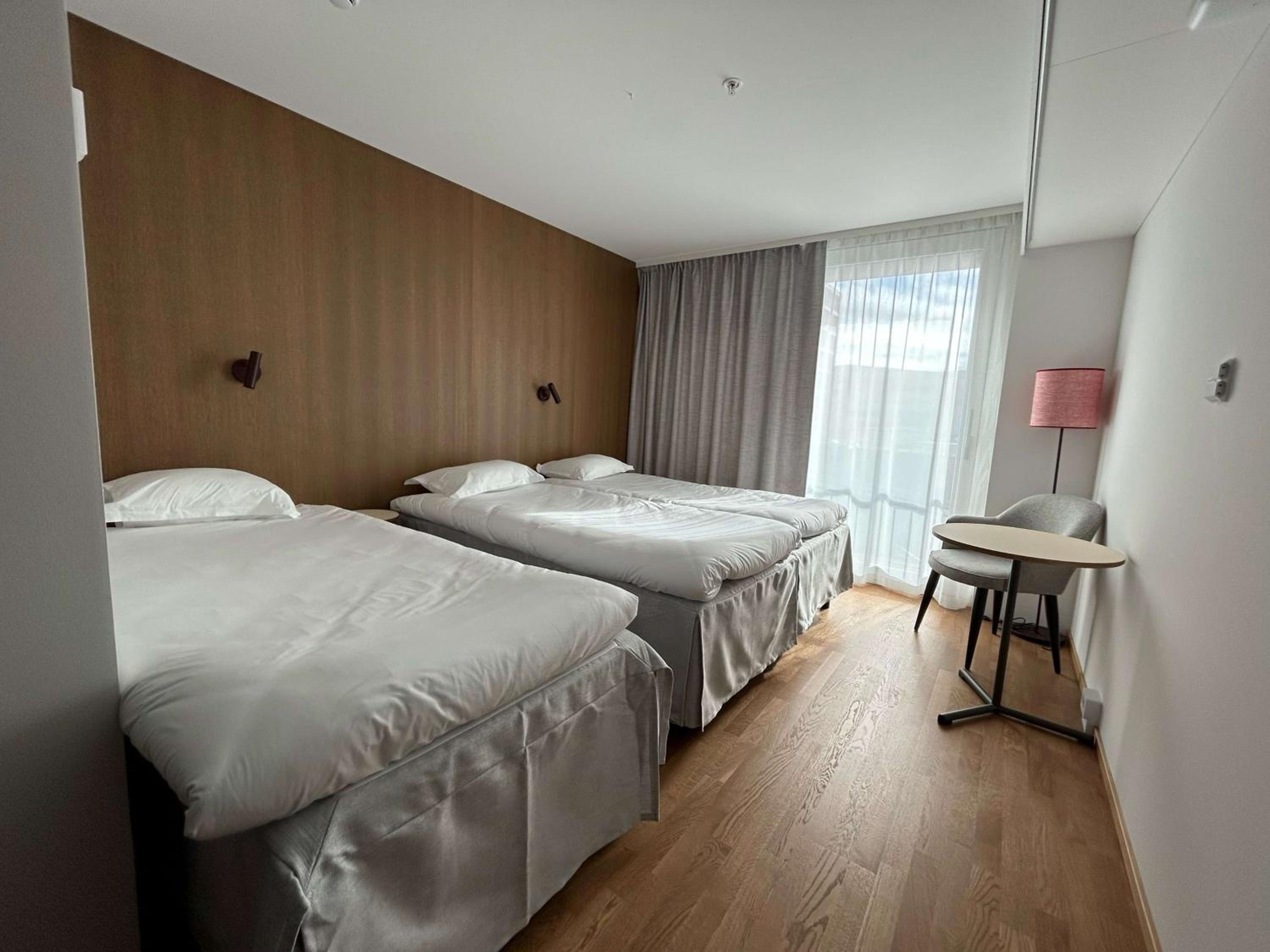 Family Room with Three Single Beds and Balcony - Non-Smoking