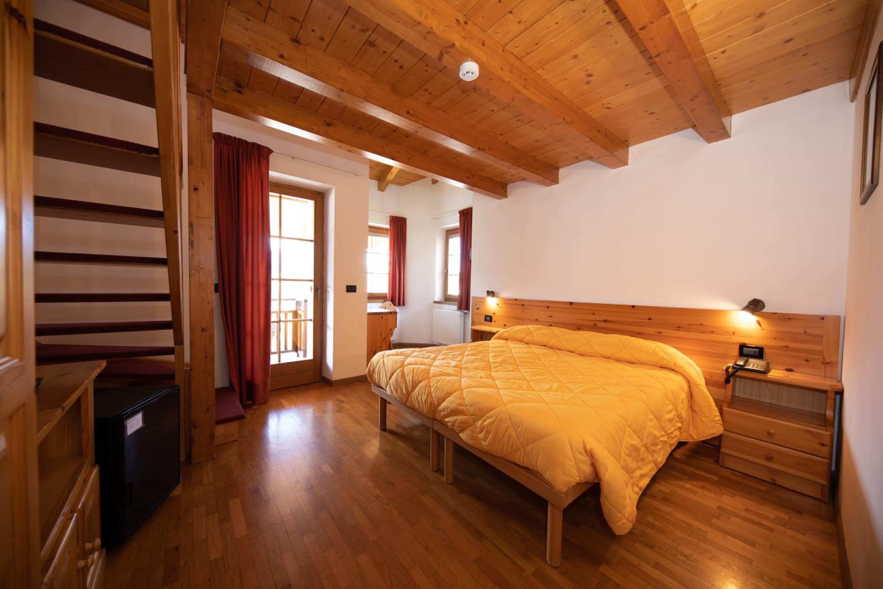 Triple Room (2 Adults + 1 Child) photo 1