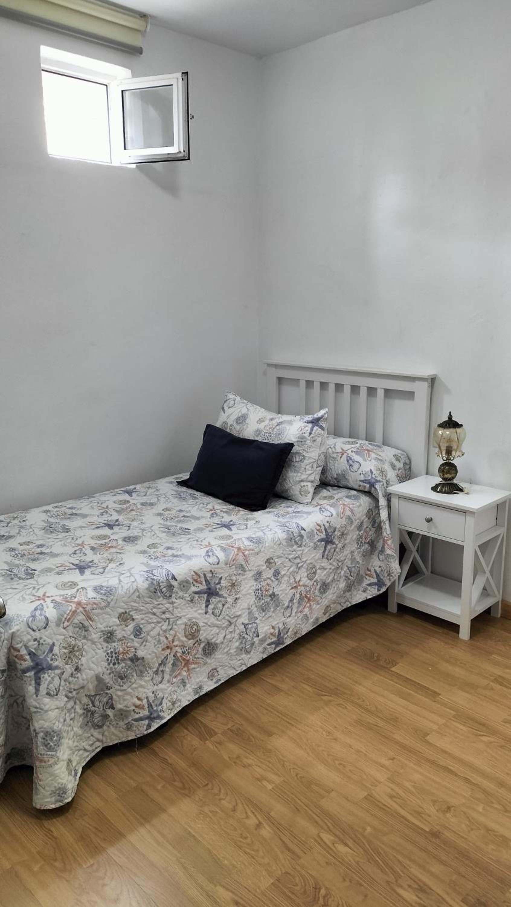 Three-Bedroom House - Photo 12