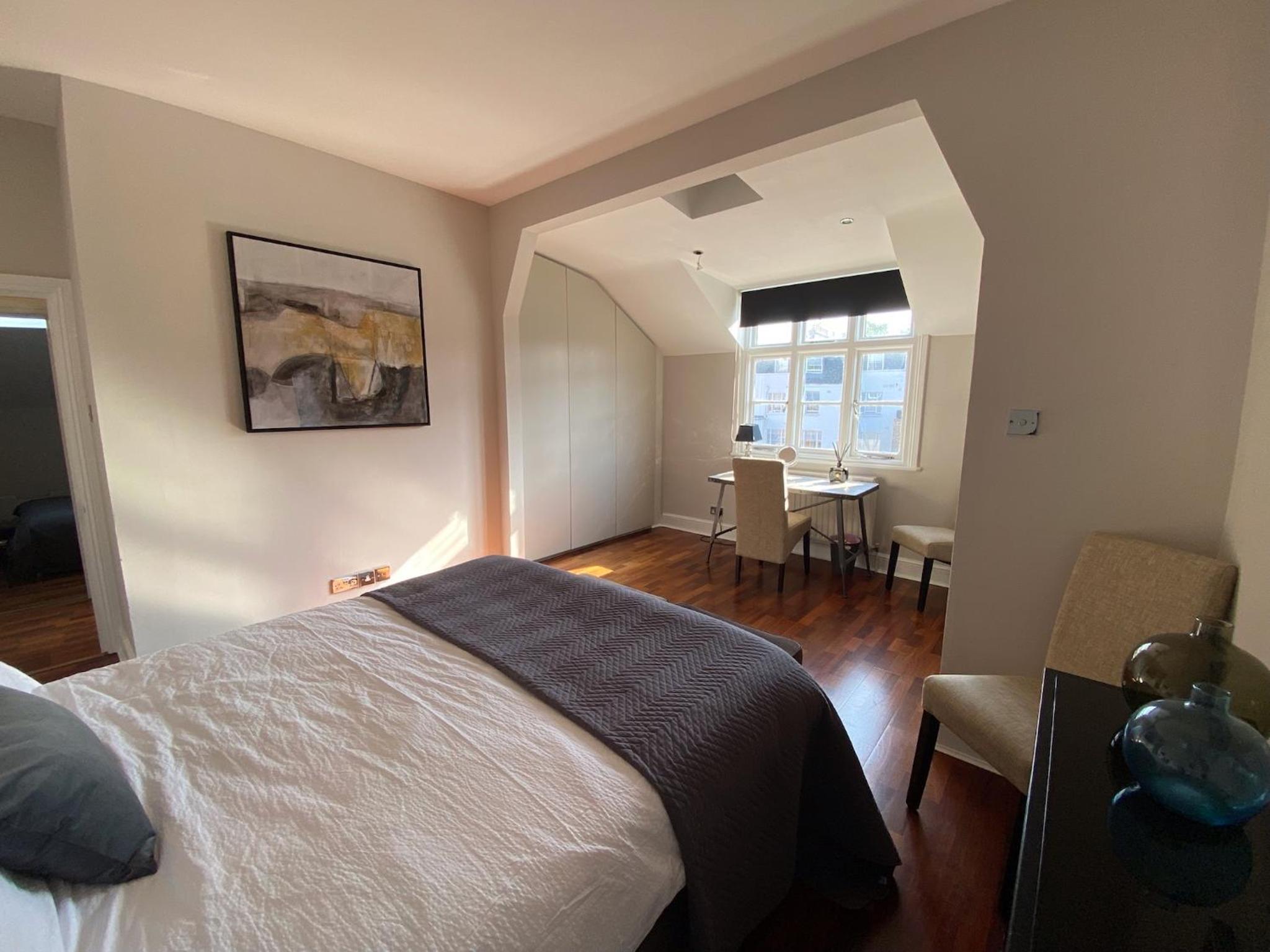 Three-Bedroom Apartment photo 2
