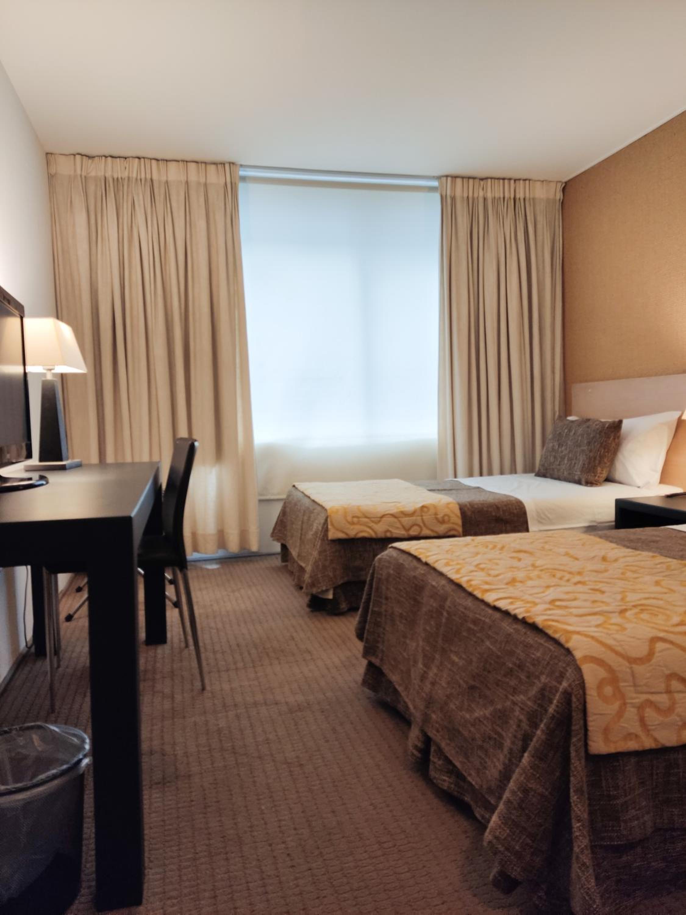 Standard Twin Room - Photo 9
