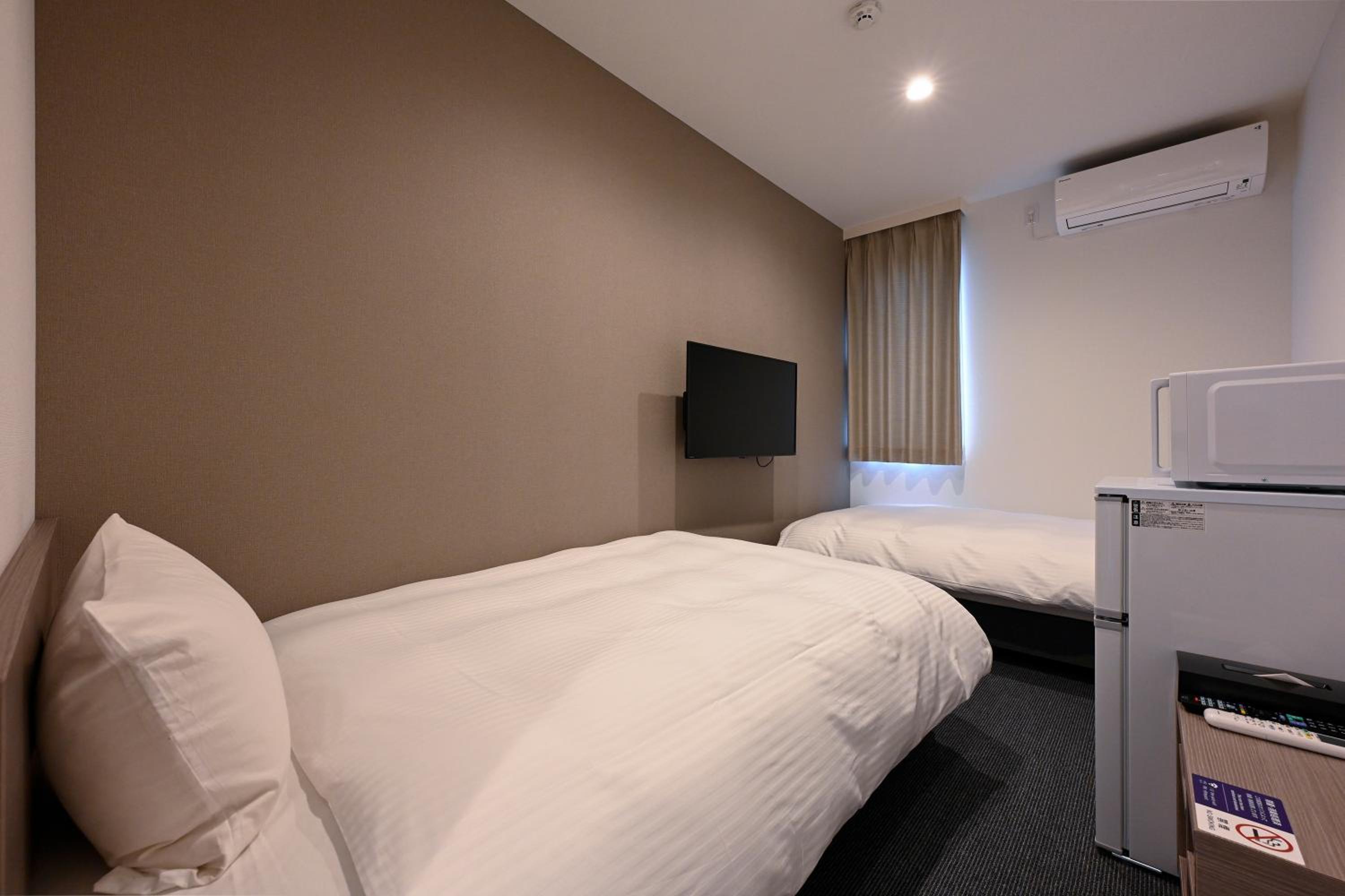 Standard Twin Room - Photo 1