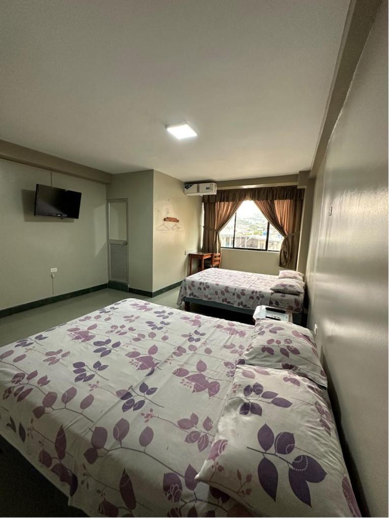 Standard Queen Room with Two Queen Beds photo 1