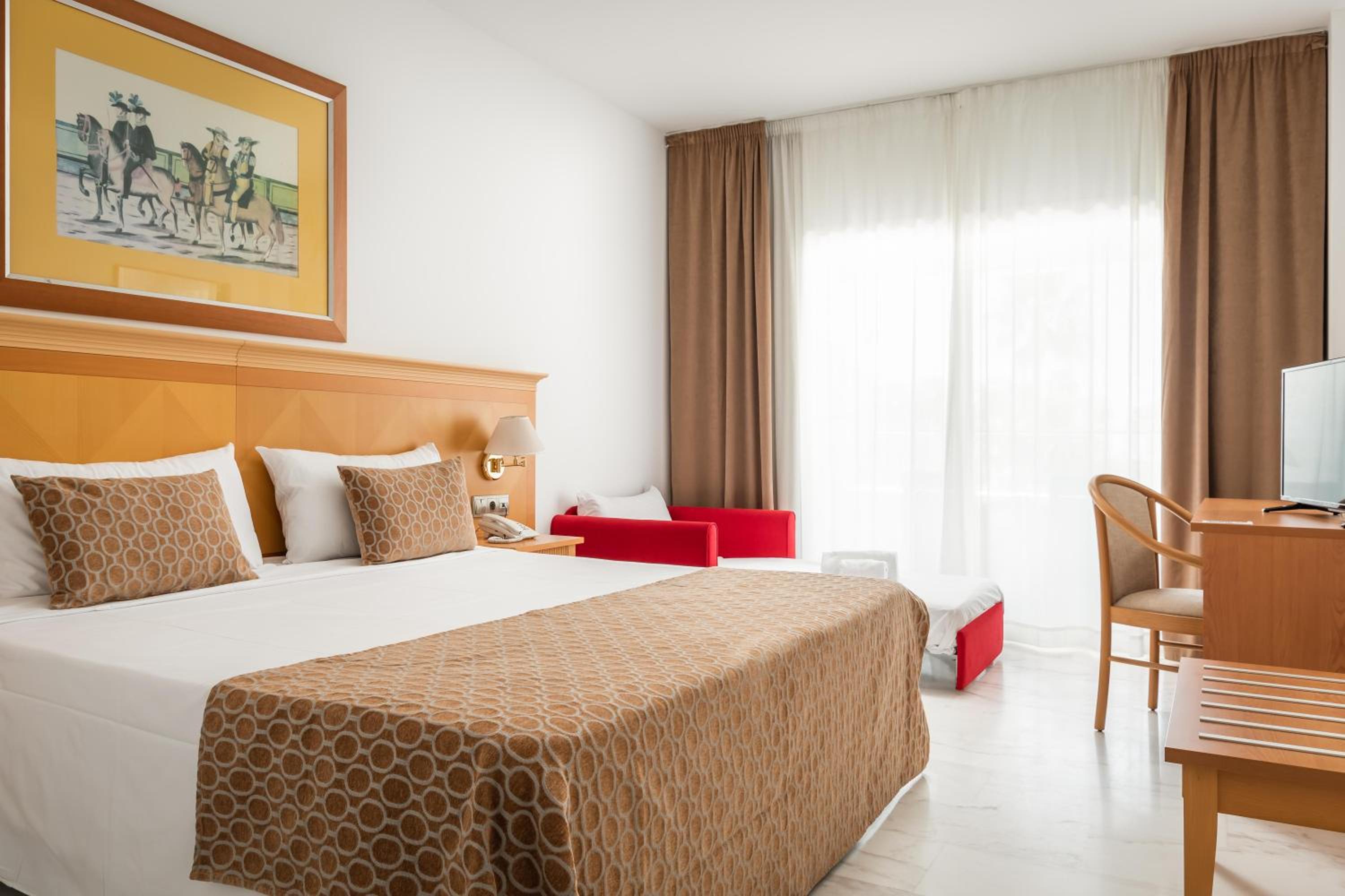 Habitación Doble con cama supletoria (2 adultos + 1 niño)