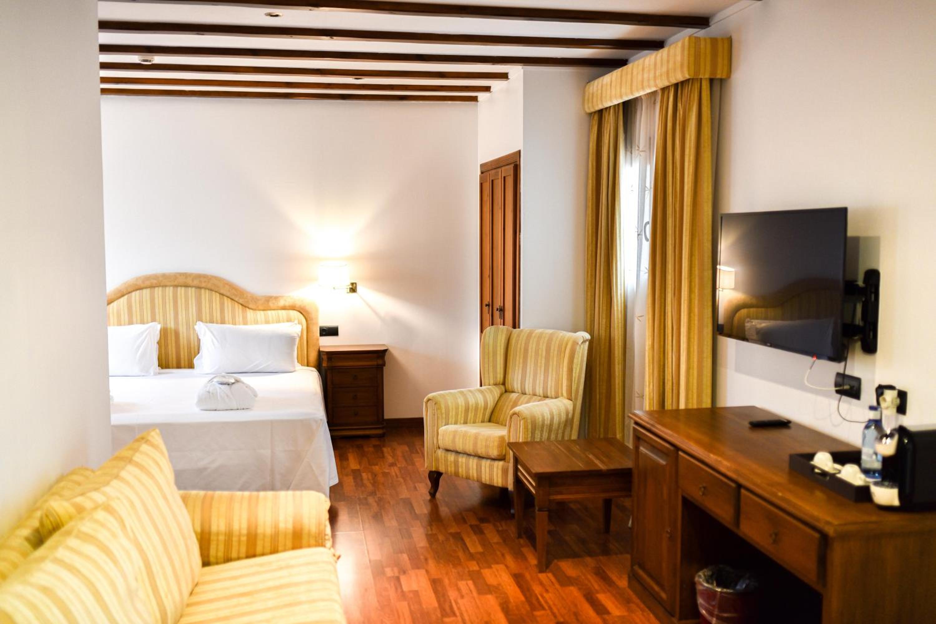 Quadruple Room (3 Adults + 1 Child)