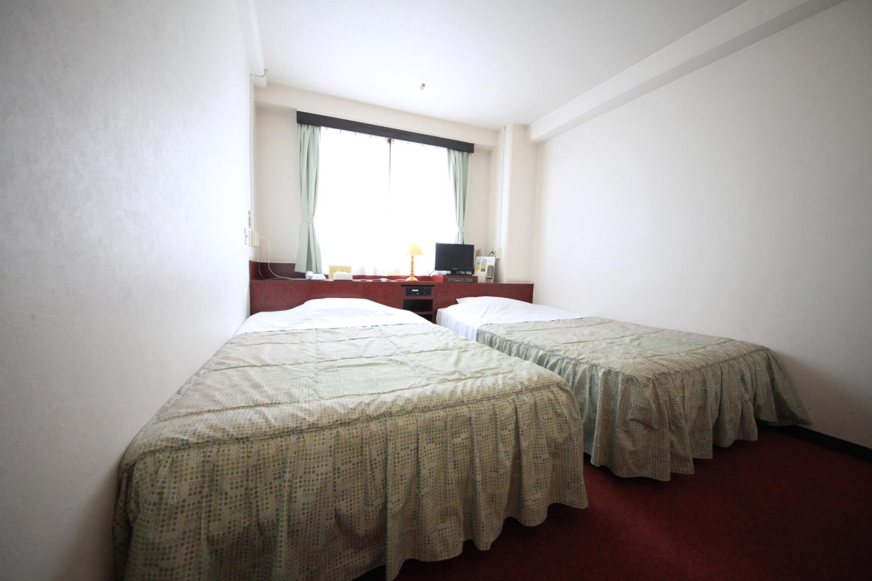 Twin Room - Photo 5
