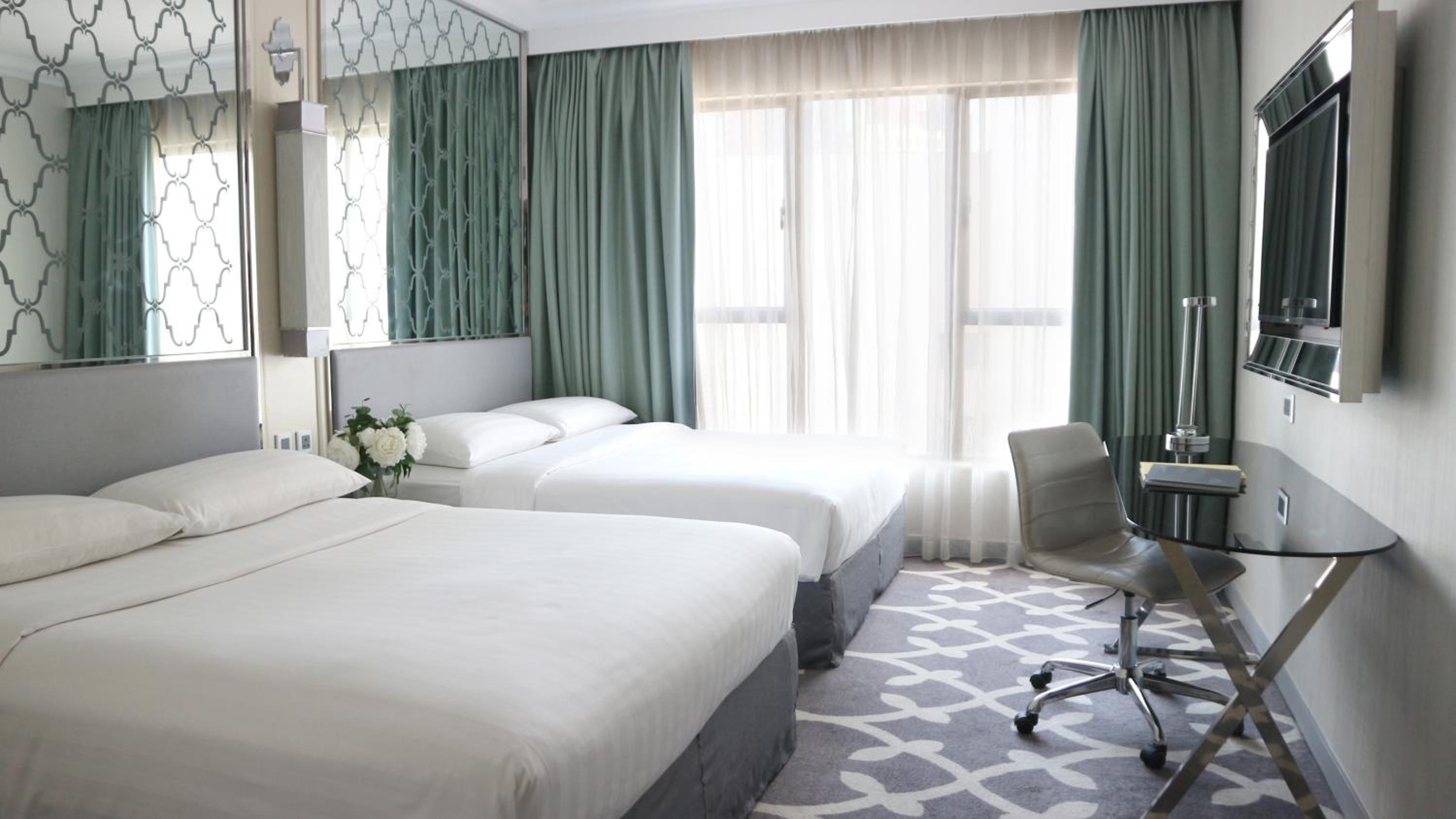 Deluxe Family Quadruple Room with 2 Queen Beds