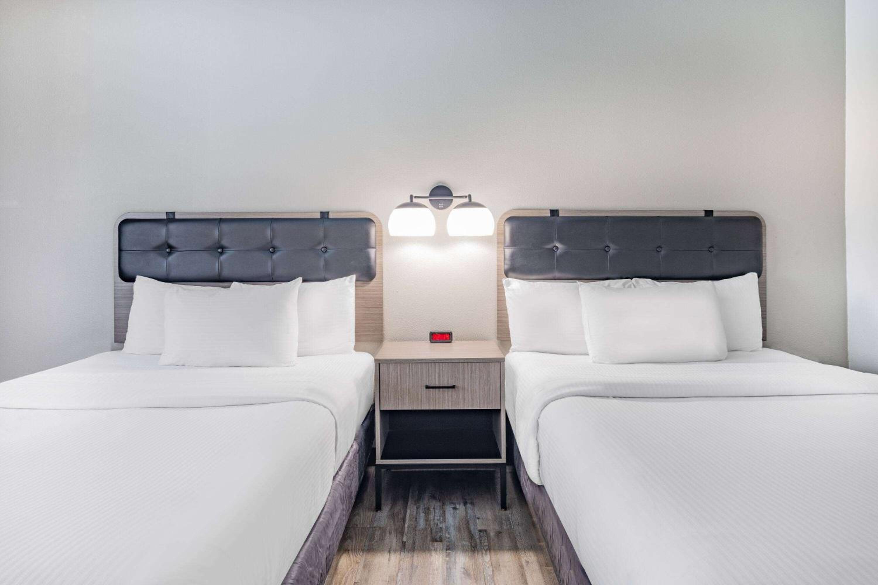Deluxe Queen Room with Two Queen Beds - Photo 1