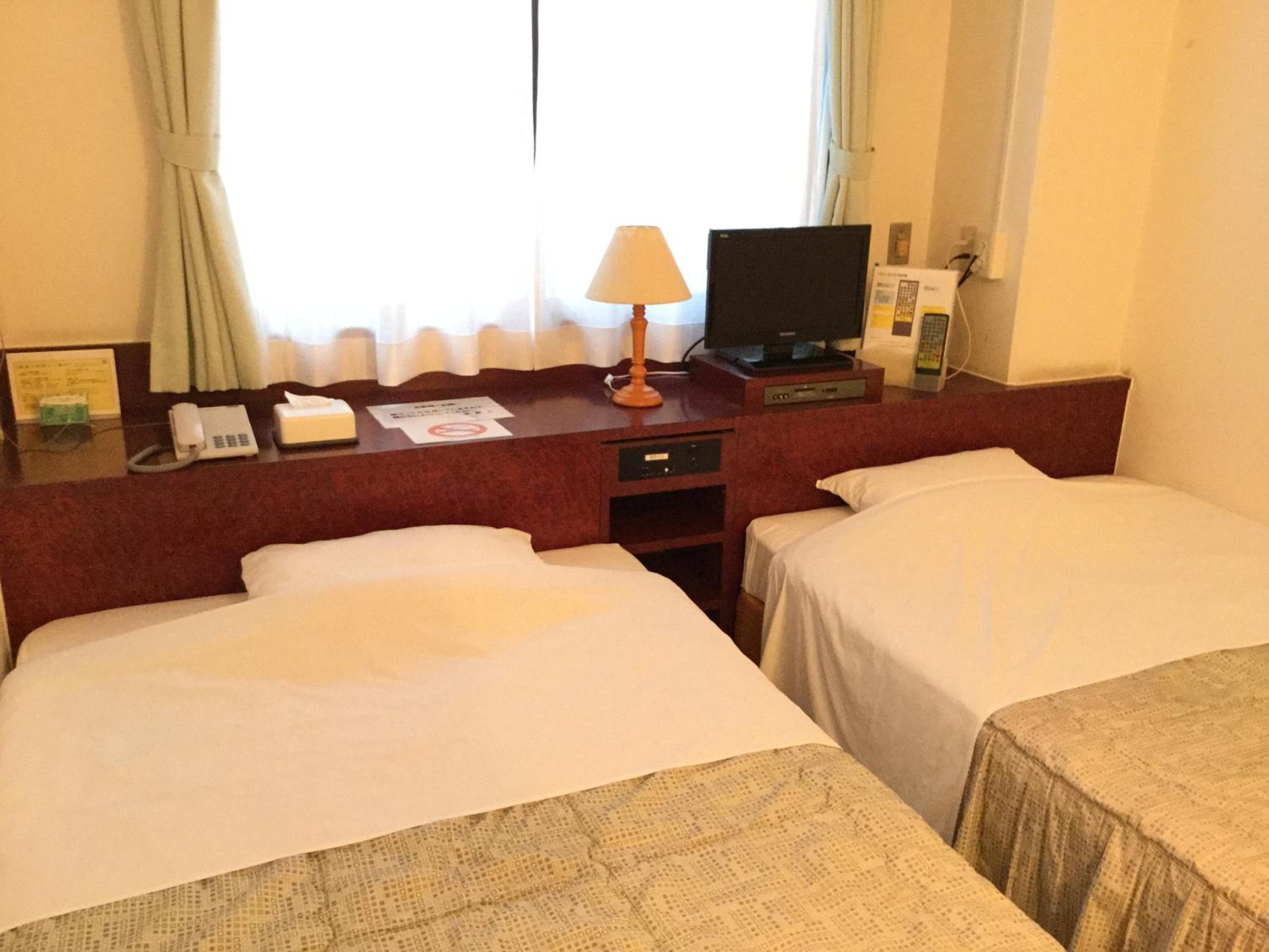 Twin Room - Photo 1