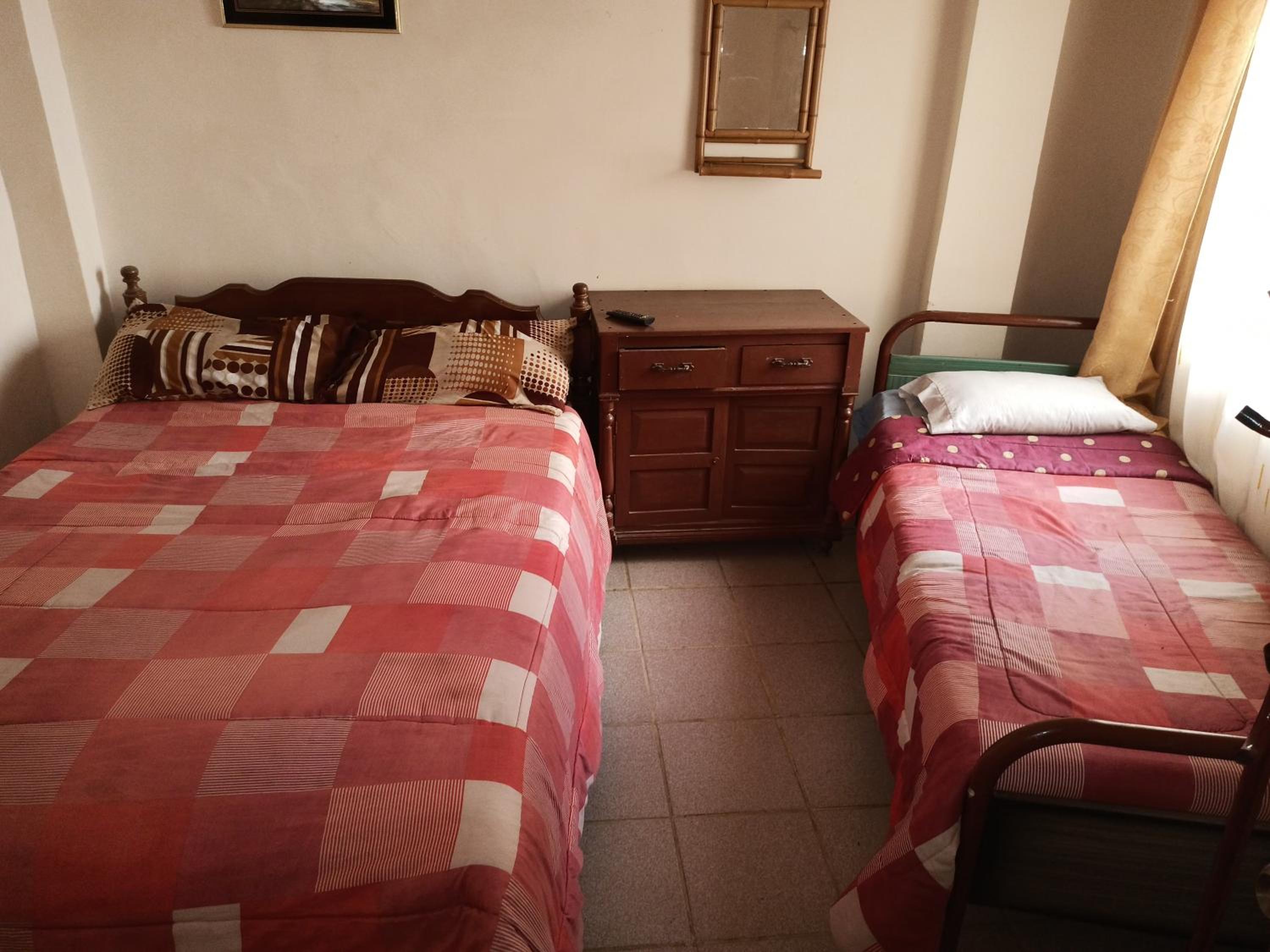 Economy Triple Room With Shared Bathroom