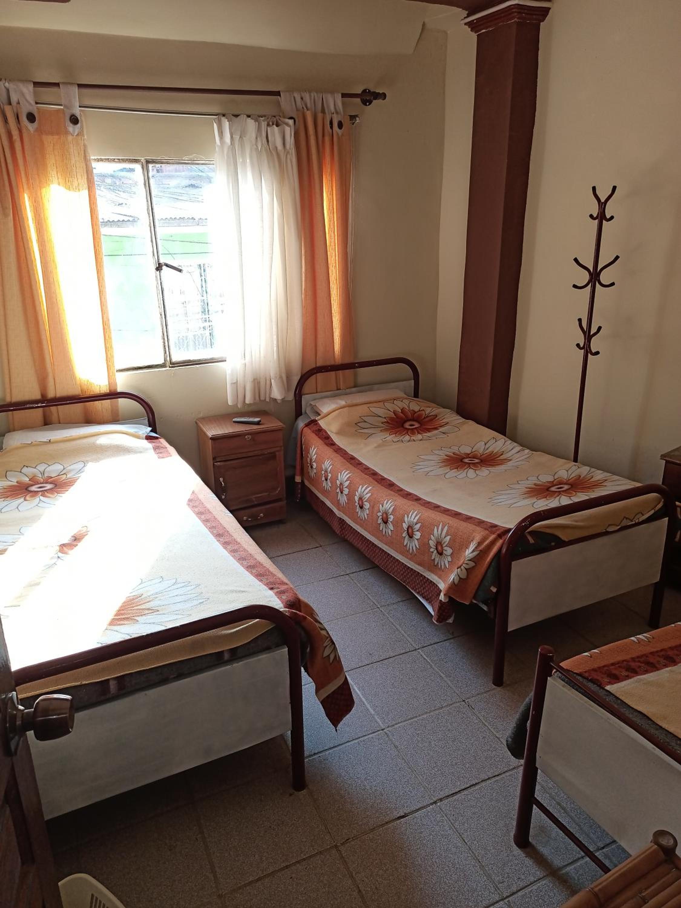 Economy Triple Room With Shared Bathroom