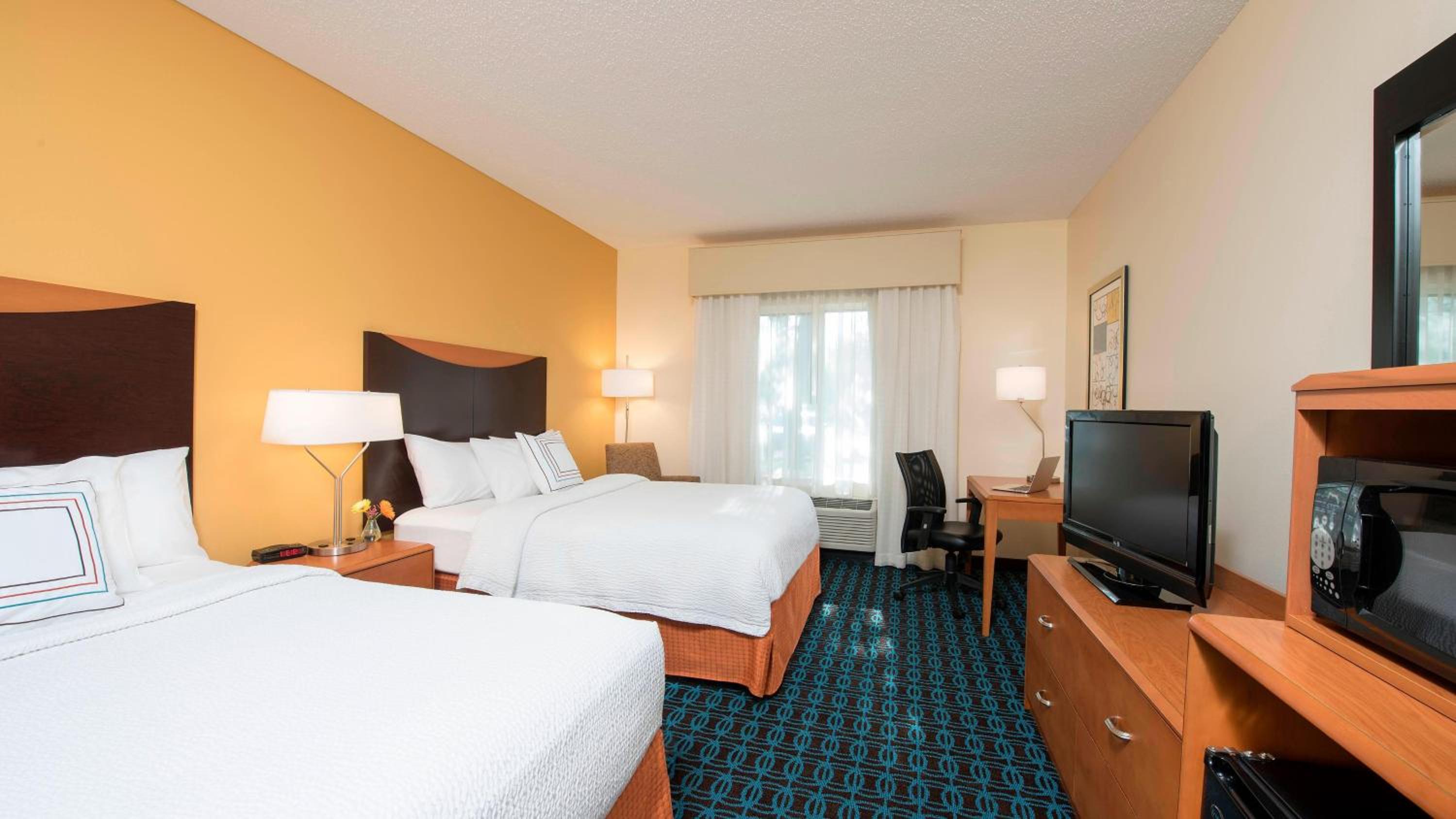 Queen Room with Two Queen Beds - Hearing Accessible photo 1
