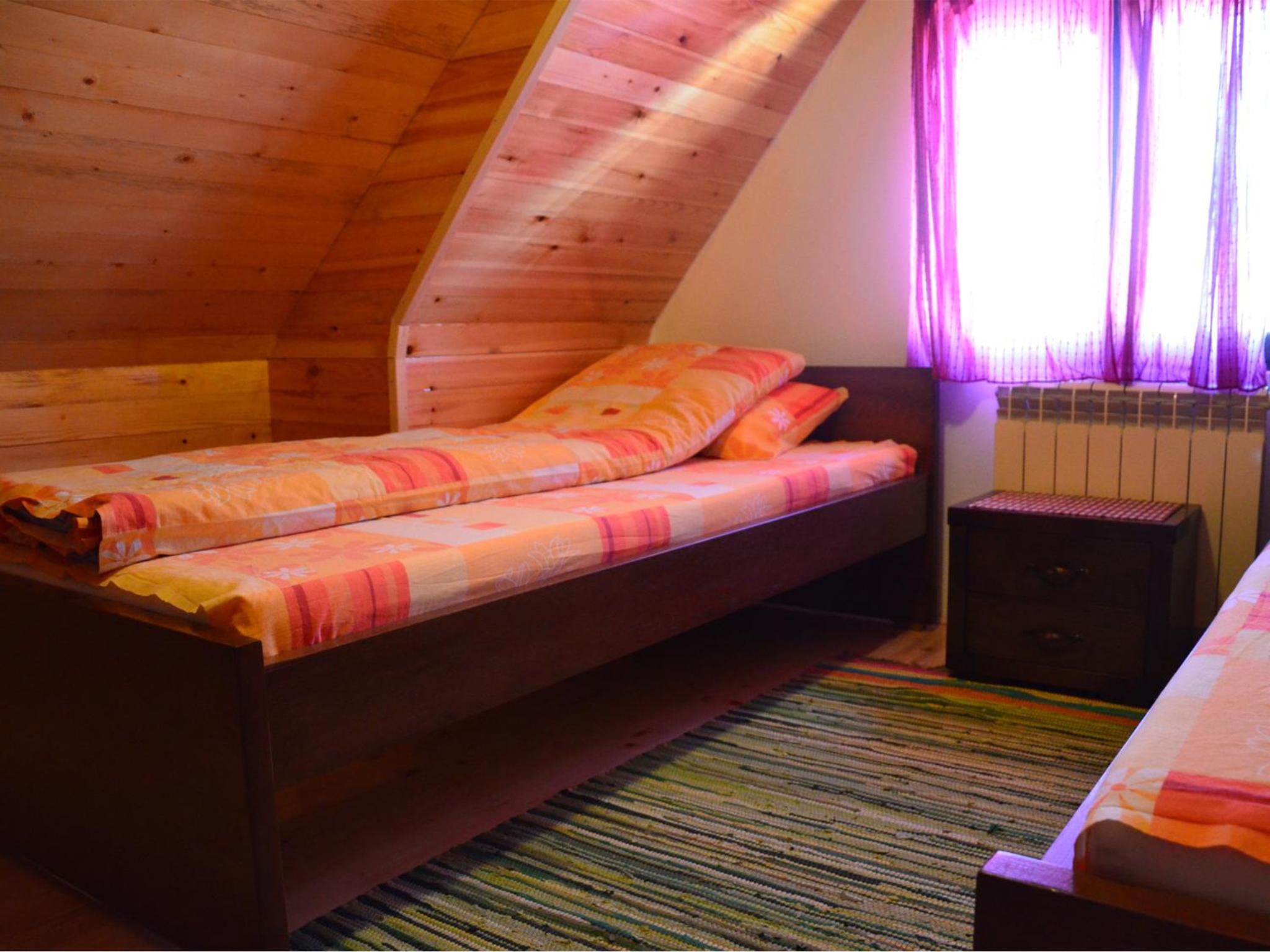 Three-Bedroom Apartment with Terrace - Photo 8