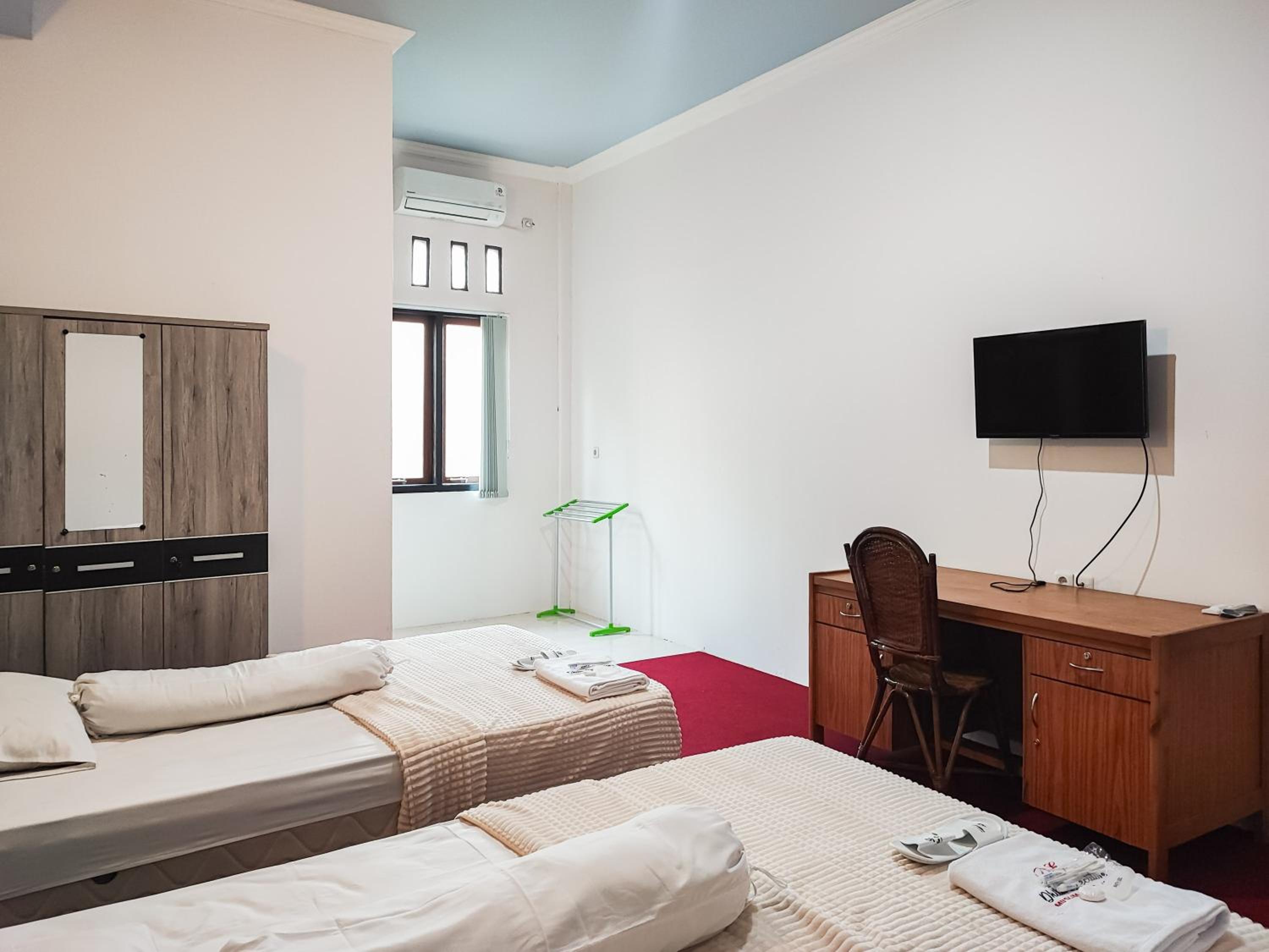Standard Twin Room - Photo 7