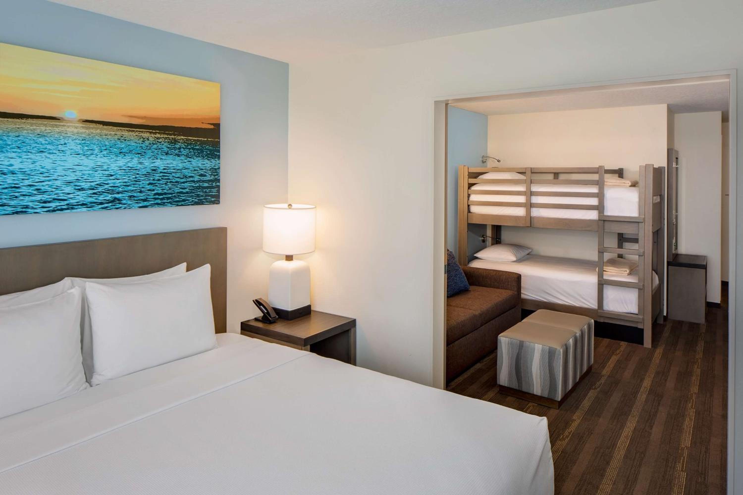One Bedroom Kitchen Suite with Two Queen Beds and Sofa Bed
