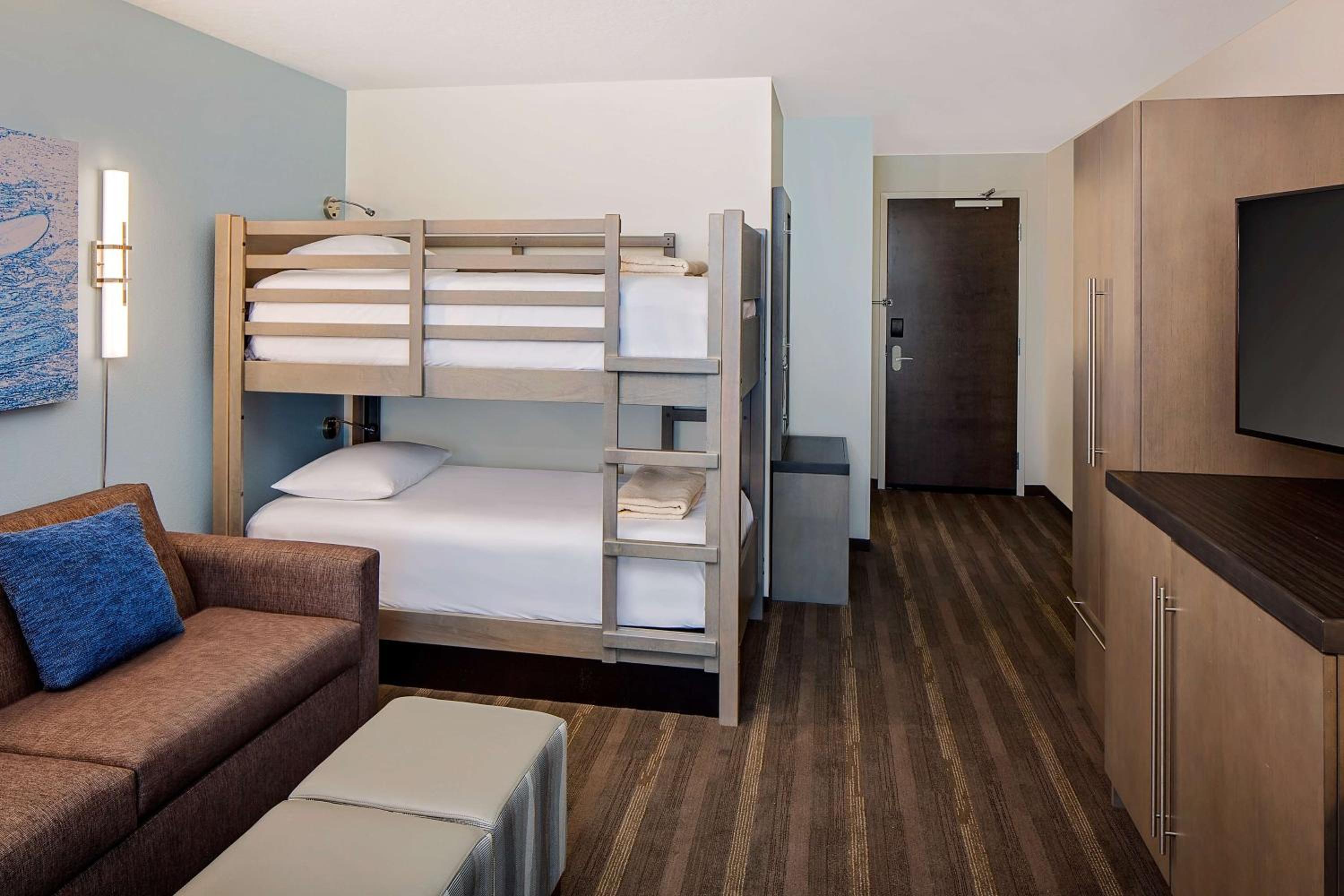 One Bedroom Kitchen Suite with Two Queen Beds and Sofa Bed