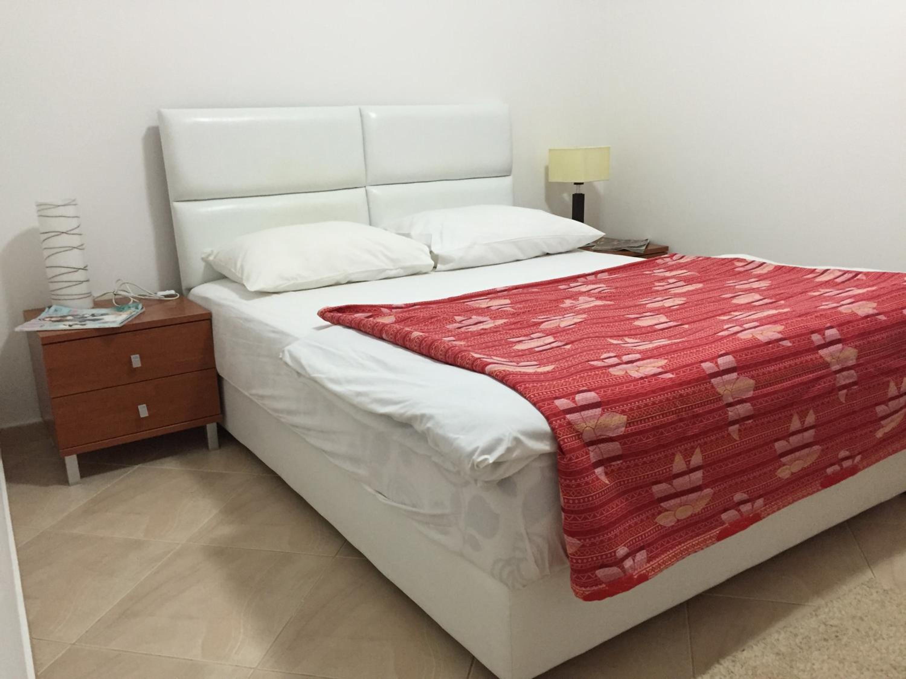 One-Bedroom Apartment with Patio and Garden View