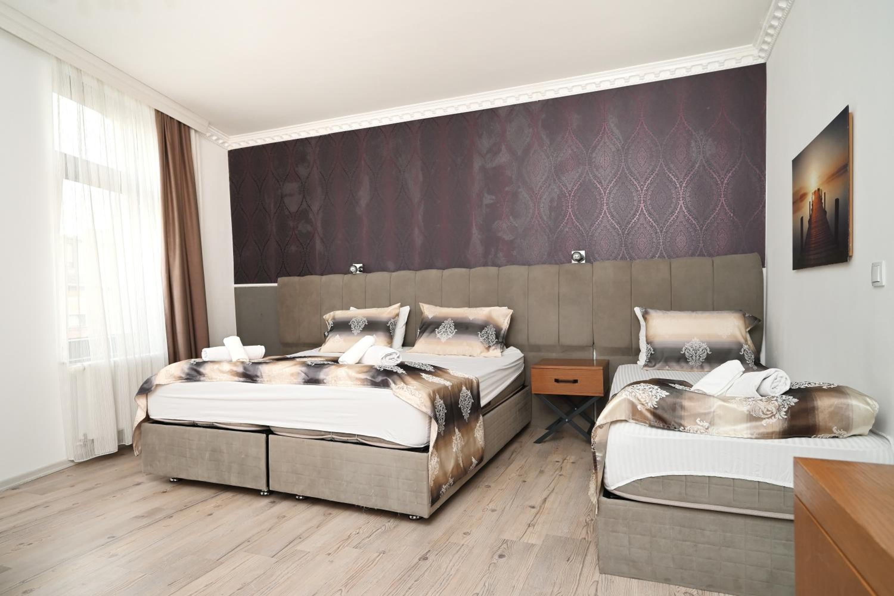Deluxe Triple Room - Photo 6
