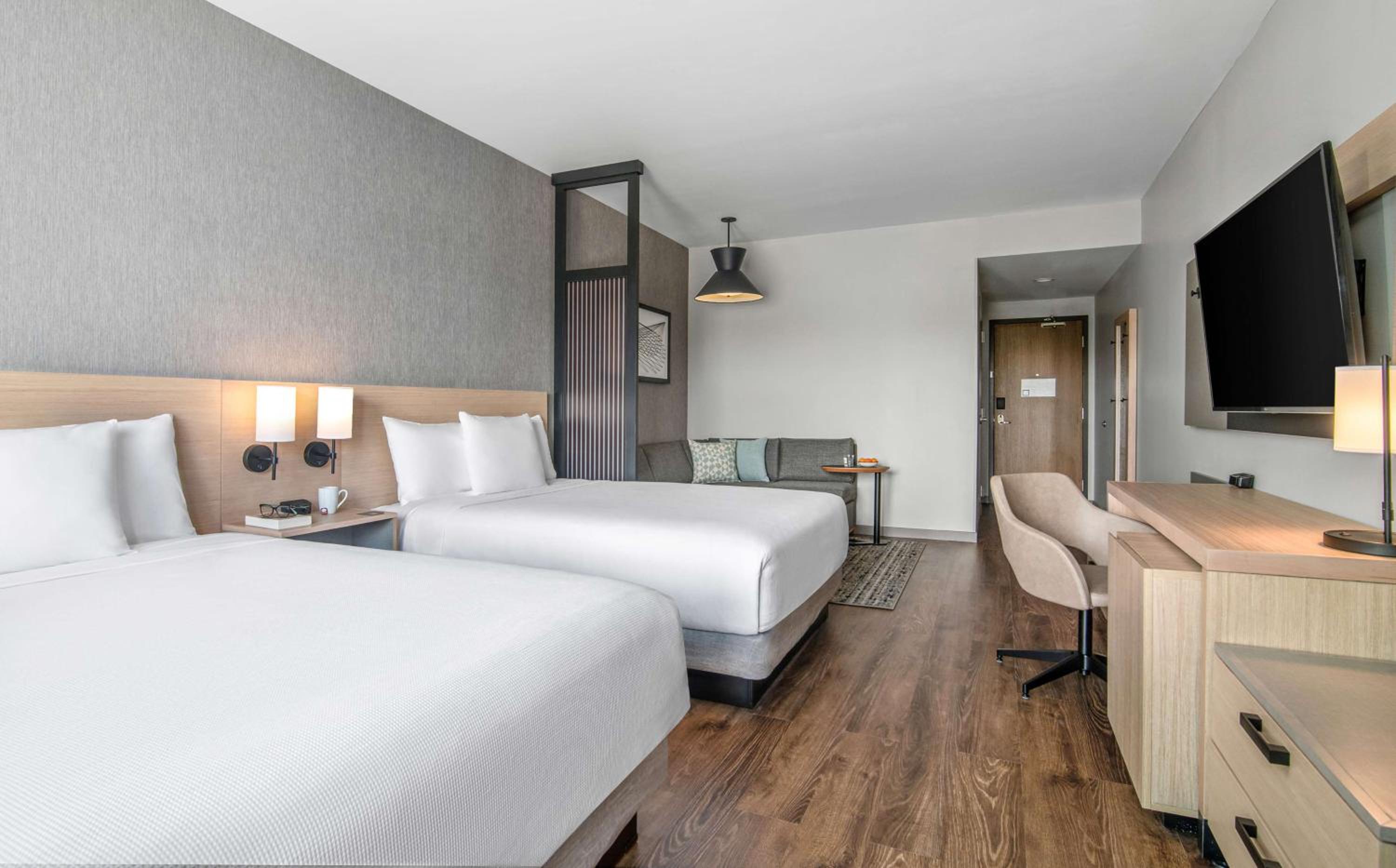 Queen Room with Two Queen Beds, Sofa Bed and Roll-in Shower - Disability Access - Photo 1
