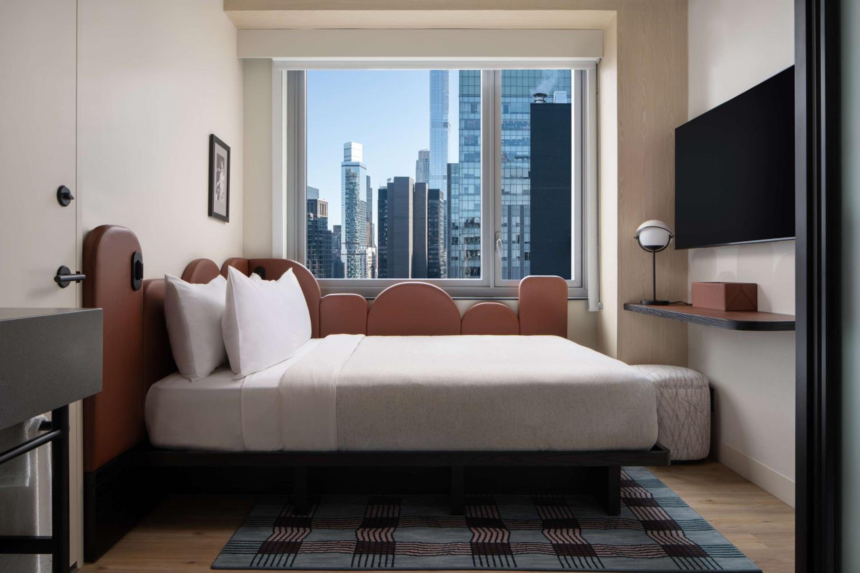Compact Queen Room with City View