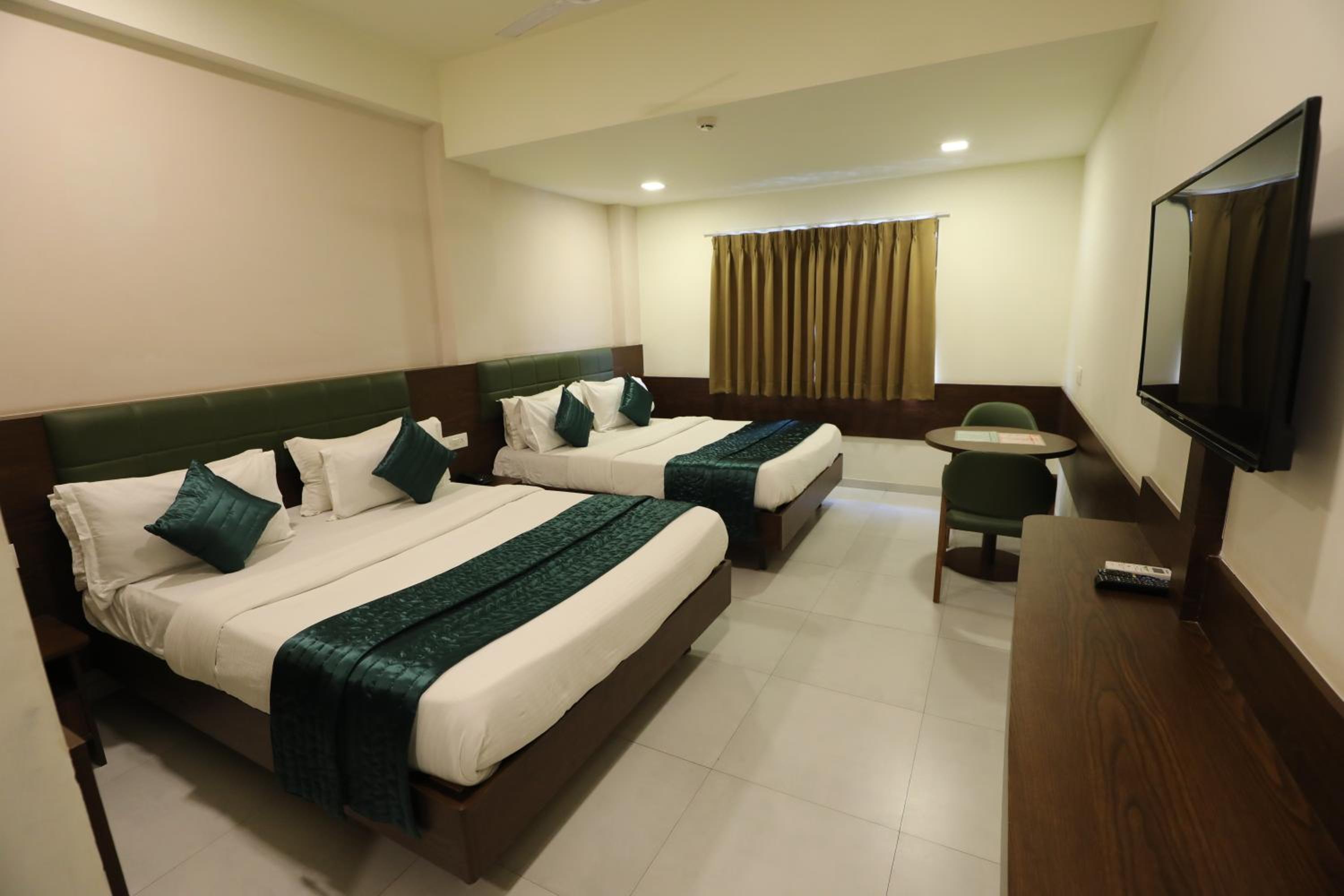 Deluxe Triple Room - Photo 7