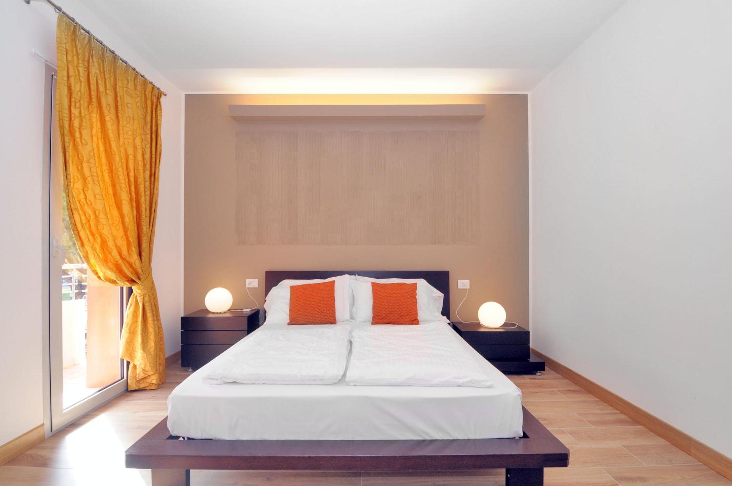 Quadruple Room with Balcony - Photo 7