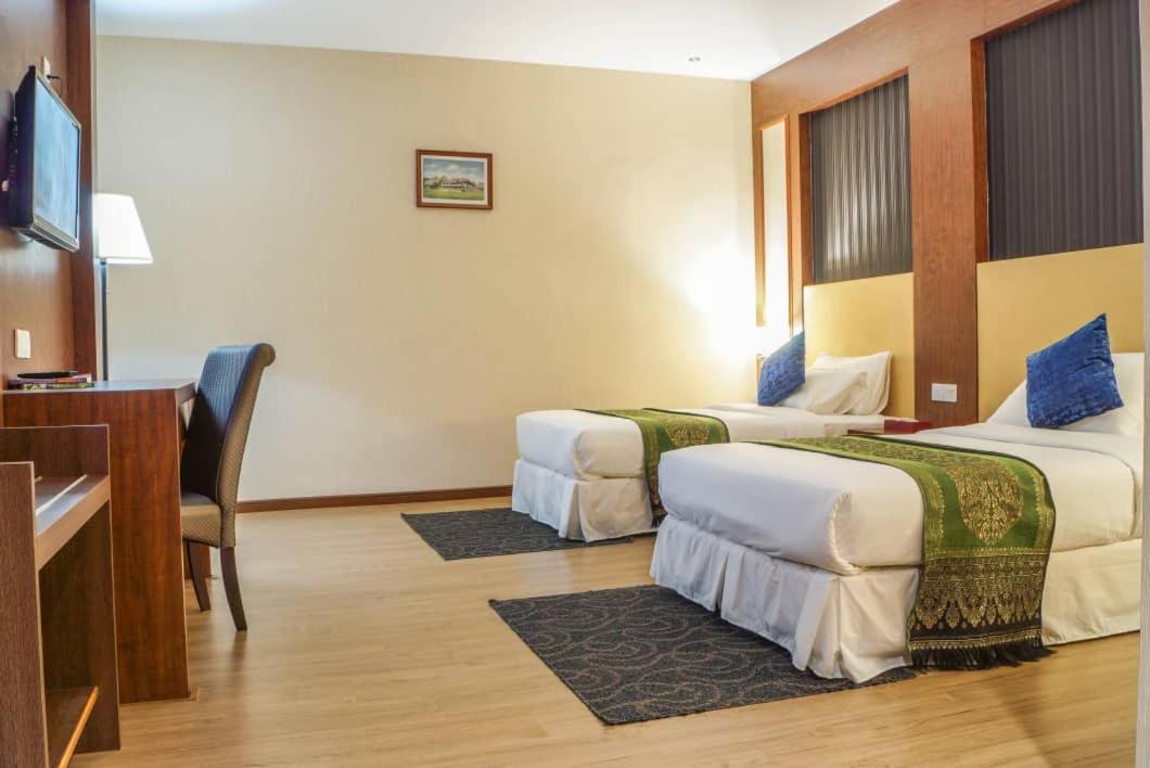 Standard Twin Room - Photo 1