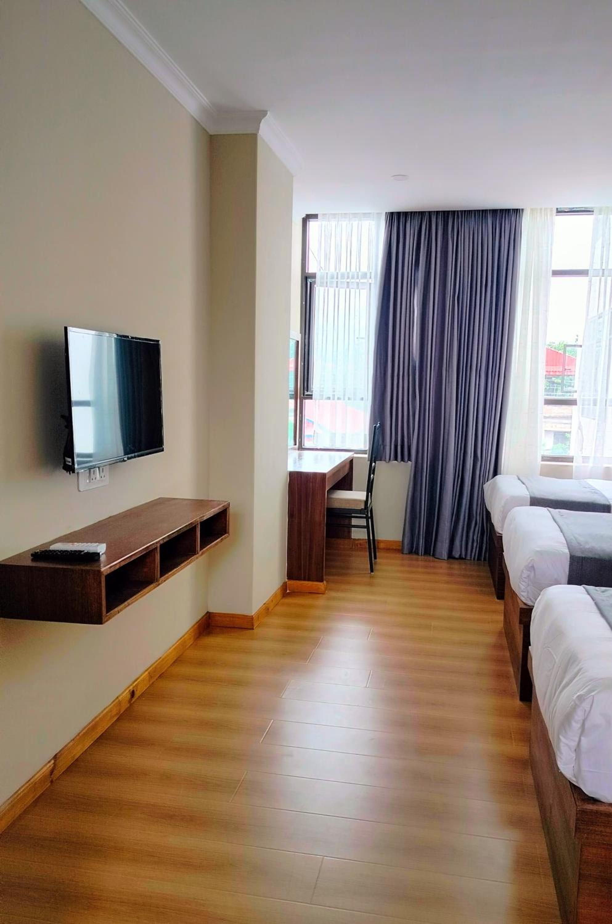 Deluxe Triple Room - Photo 3