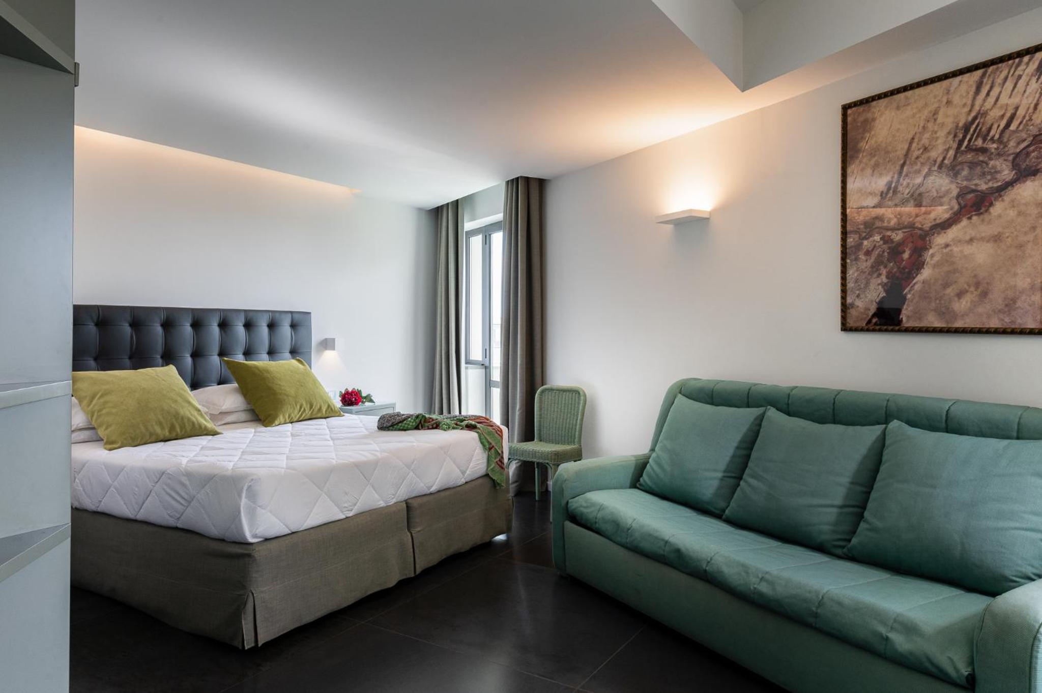 Deluxe Quadruple Room - Photo 2