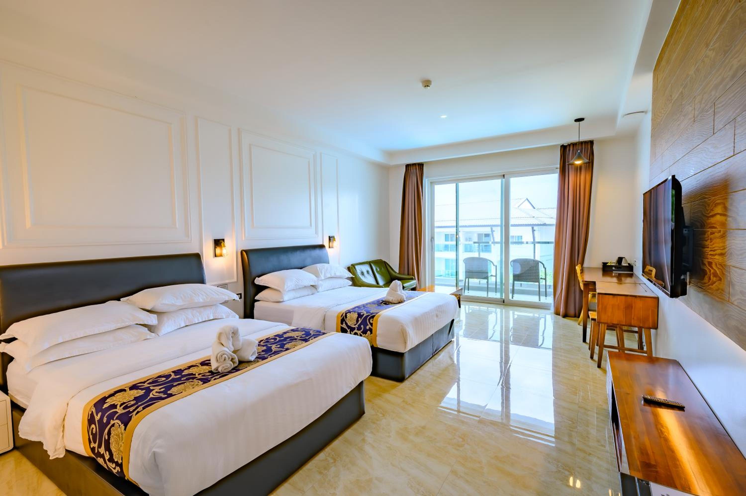Deluxe Queen Room with Two Queen Beds - Photo 1