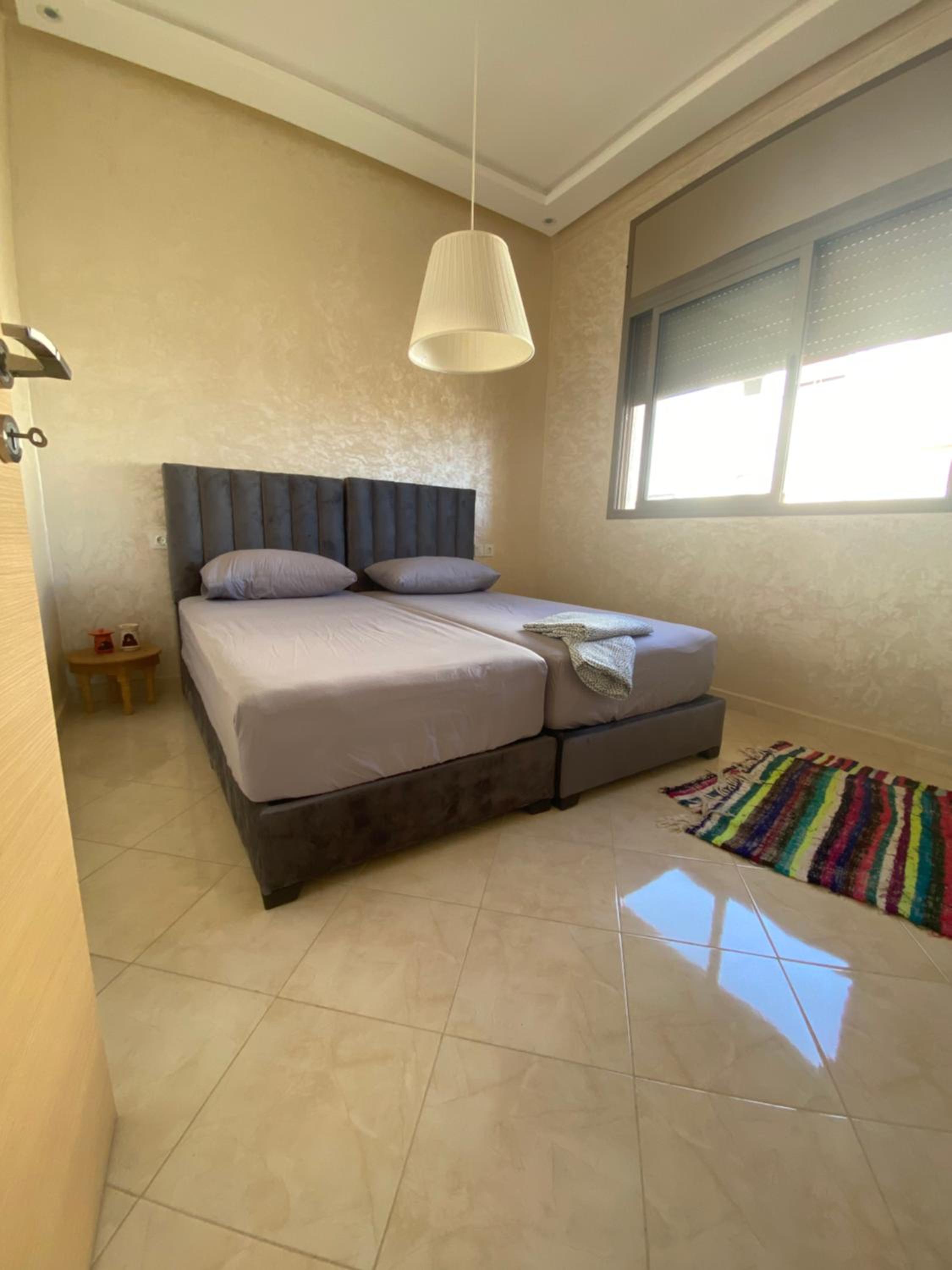 Two-Bedroom Apartment - Photo 18