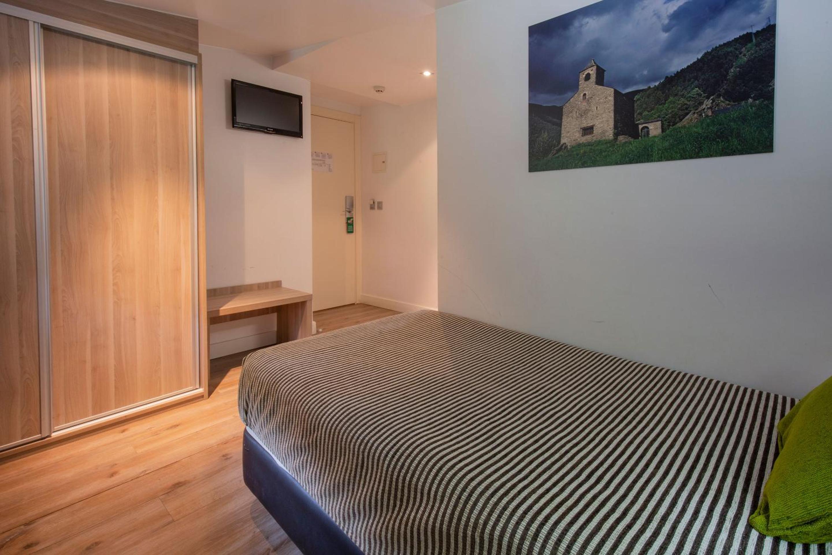 Triple Room (2 Adults + 1 Child)