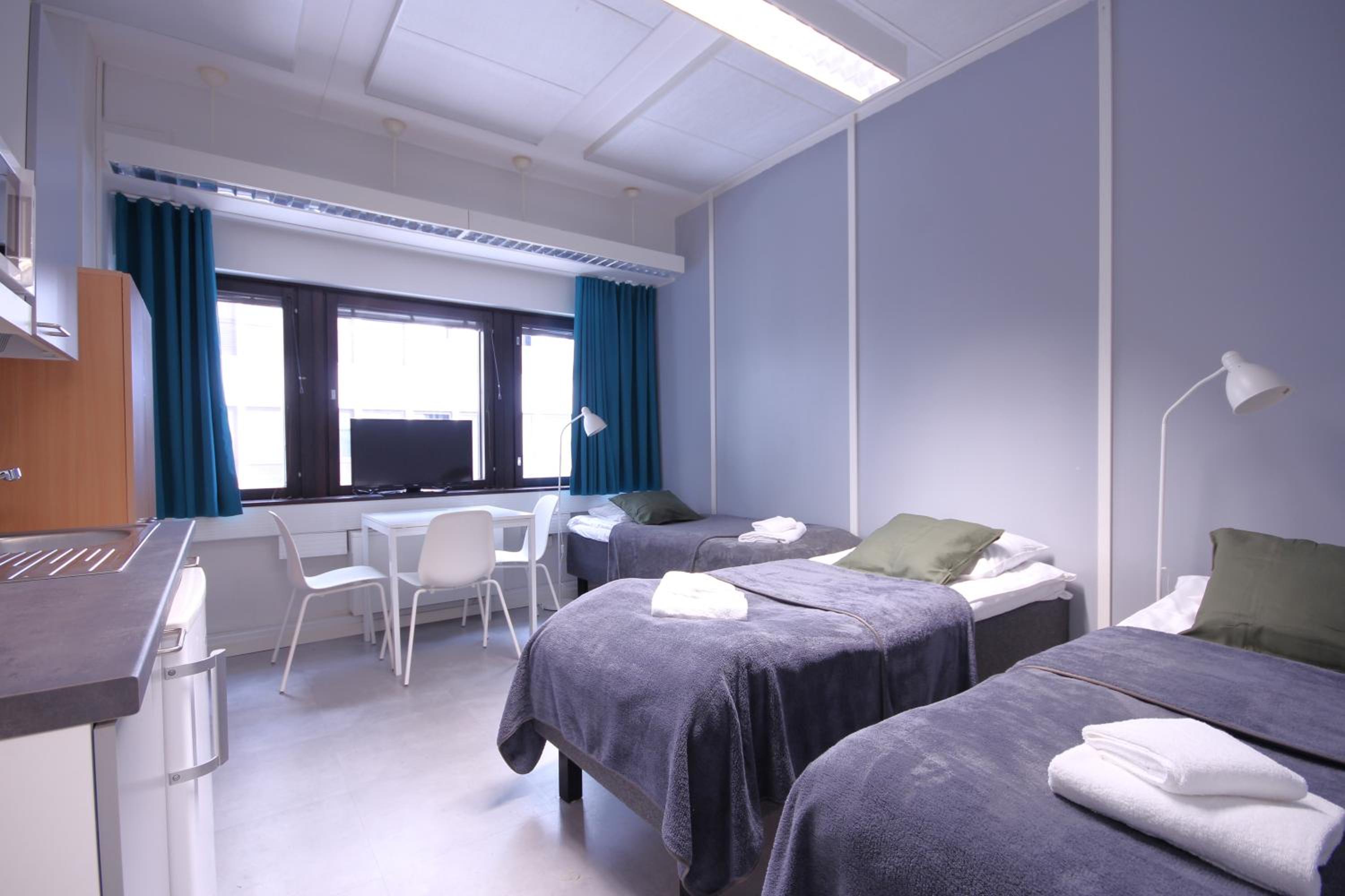 Economy Triple Room With Shared Bathroom photo 1