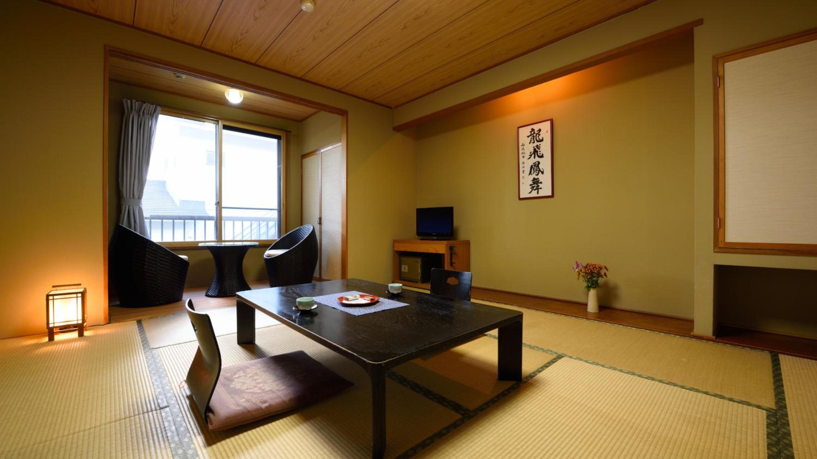 Twin Room With Tatami Area And Shared Bath - Photo 1