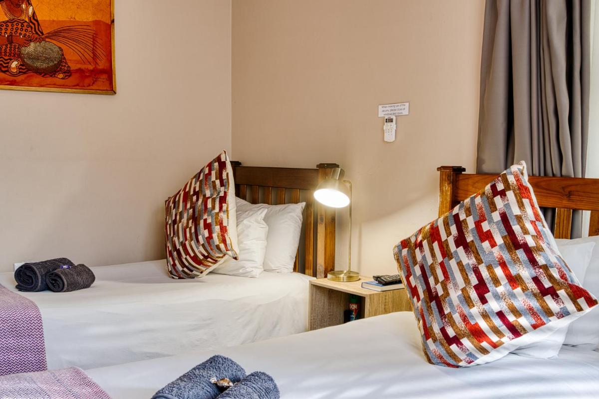 Twin Room - Photo 1