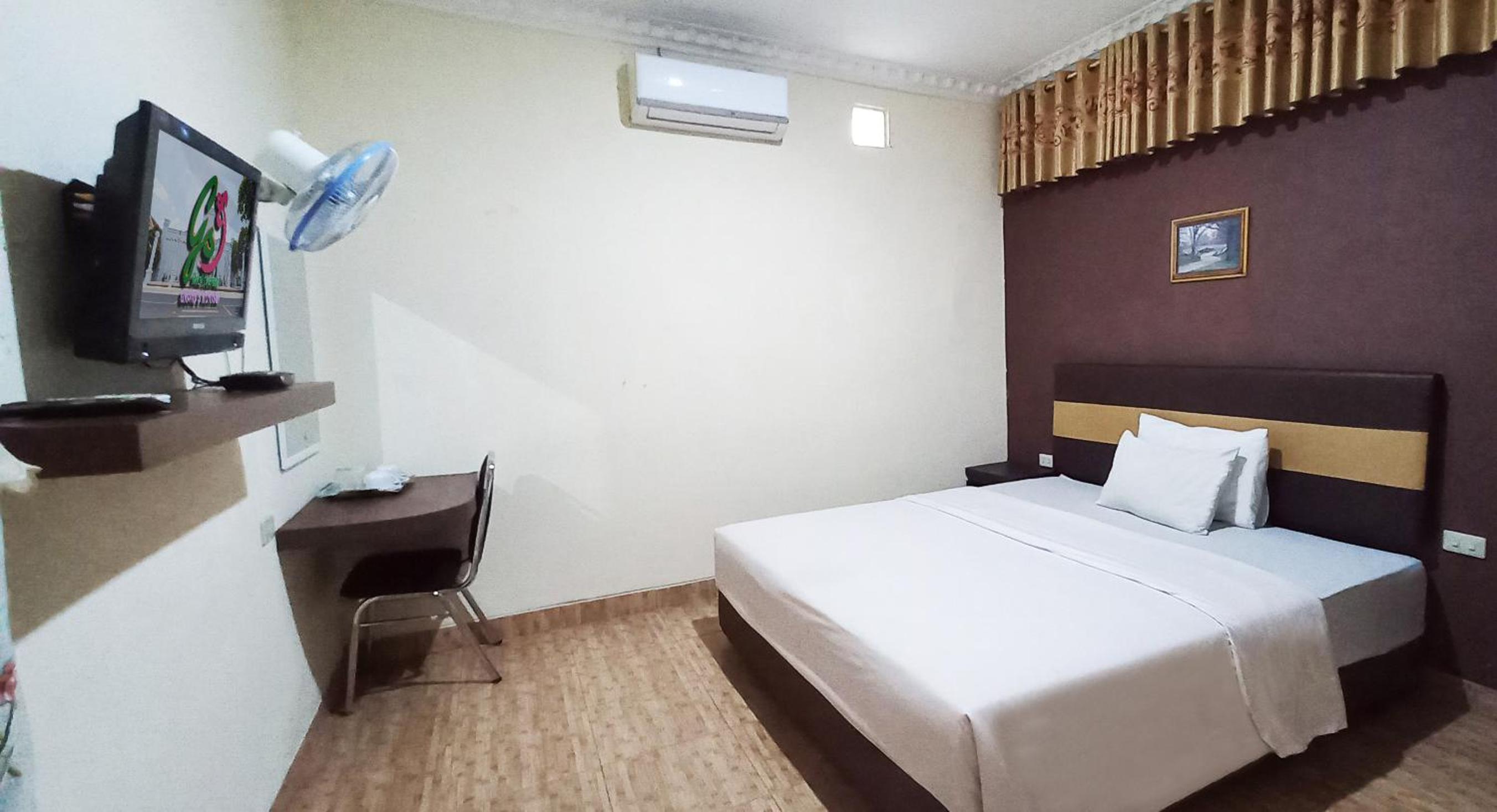 Deluxe Room - Photo 2