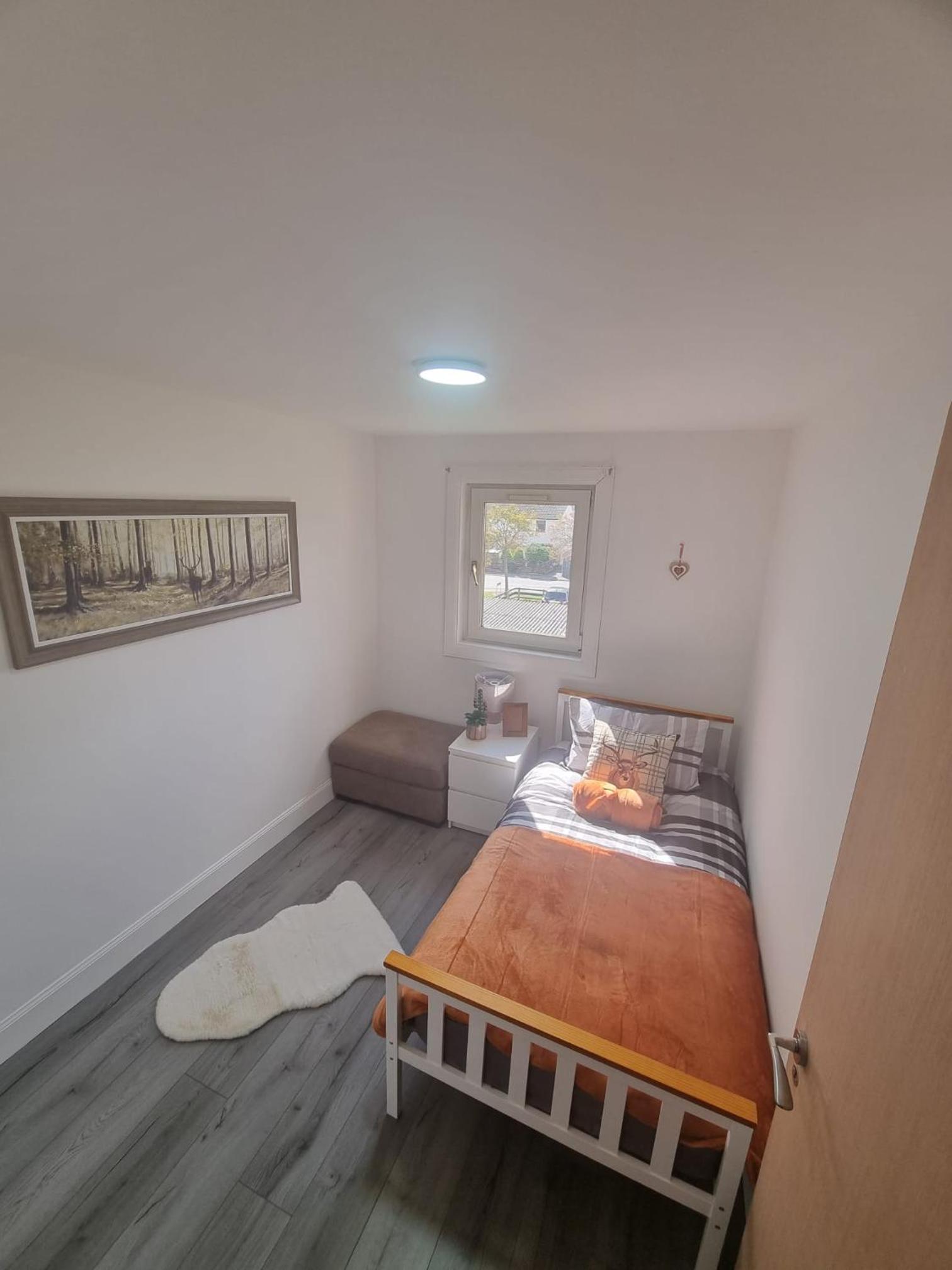 Three-Bedroom Apartment photo 1