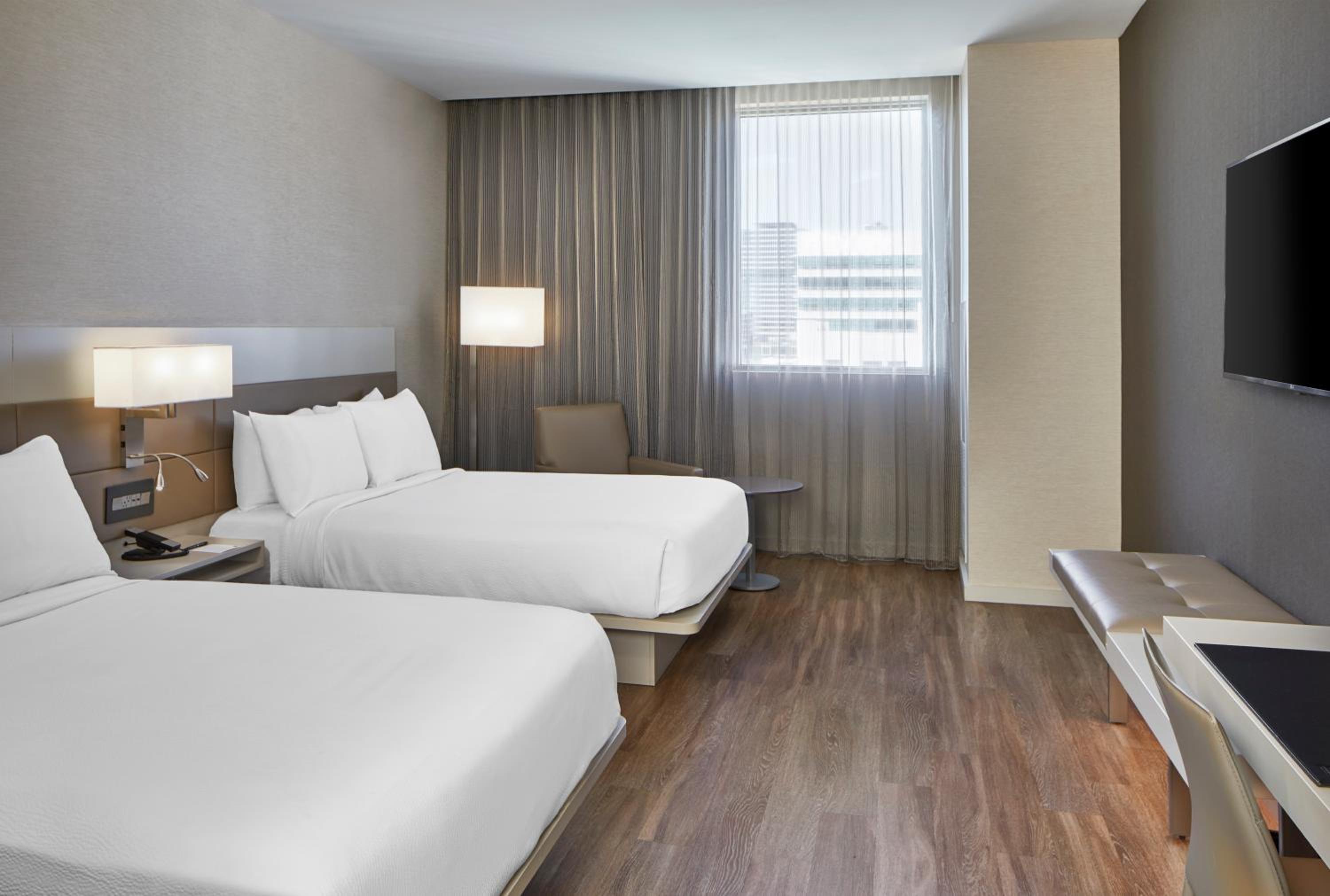 Double Room with Two Double Beds and Adapted Tub - Mobility Accessible