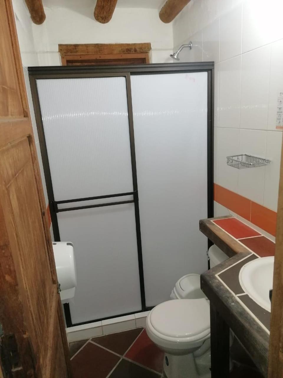 Basic Triple Room With Shared Bathroom photo 2