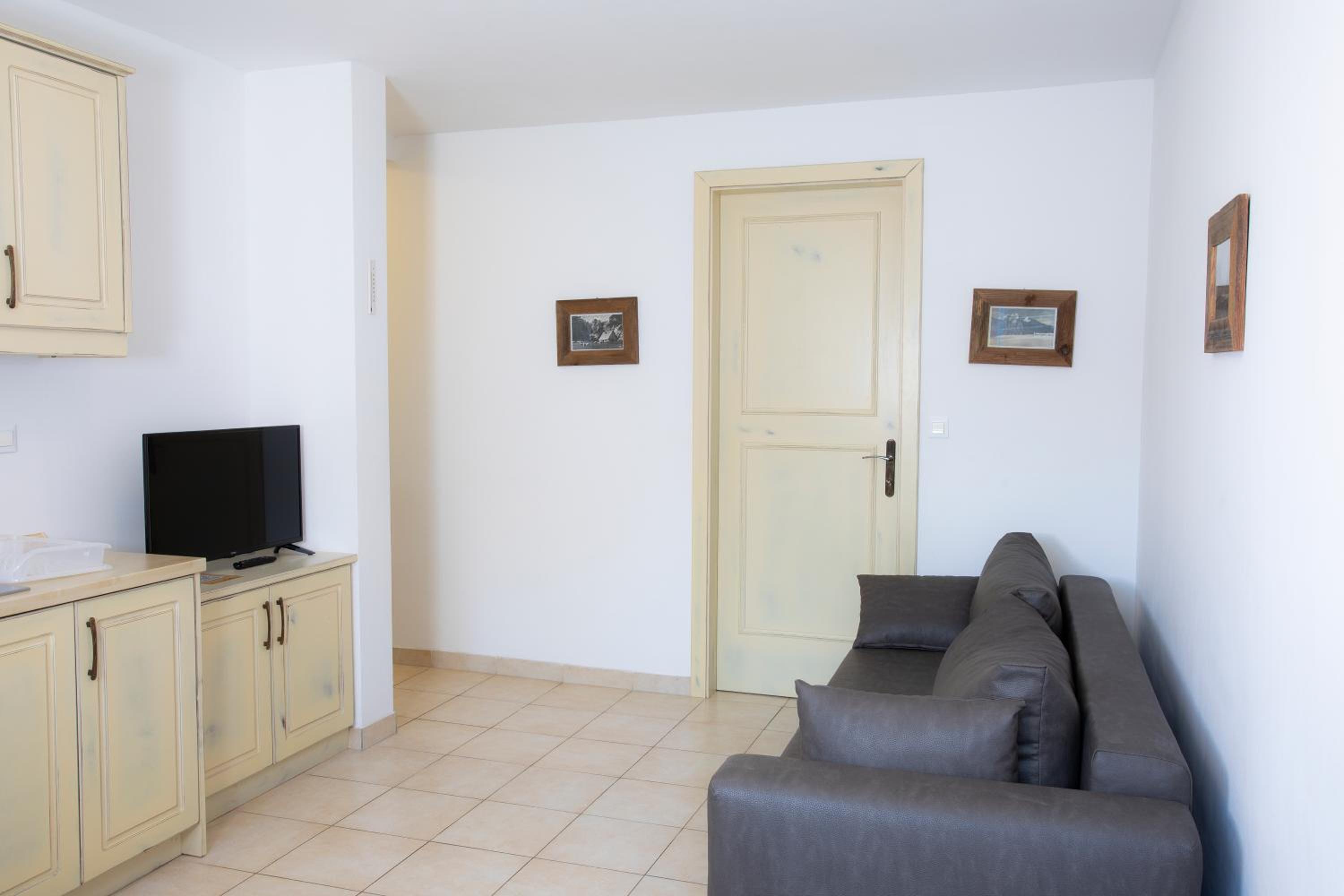 Two-Bedroom Apartment with Terrace - Half Basement