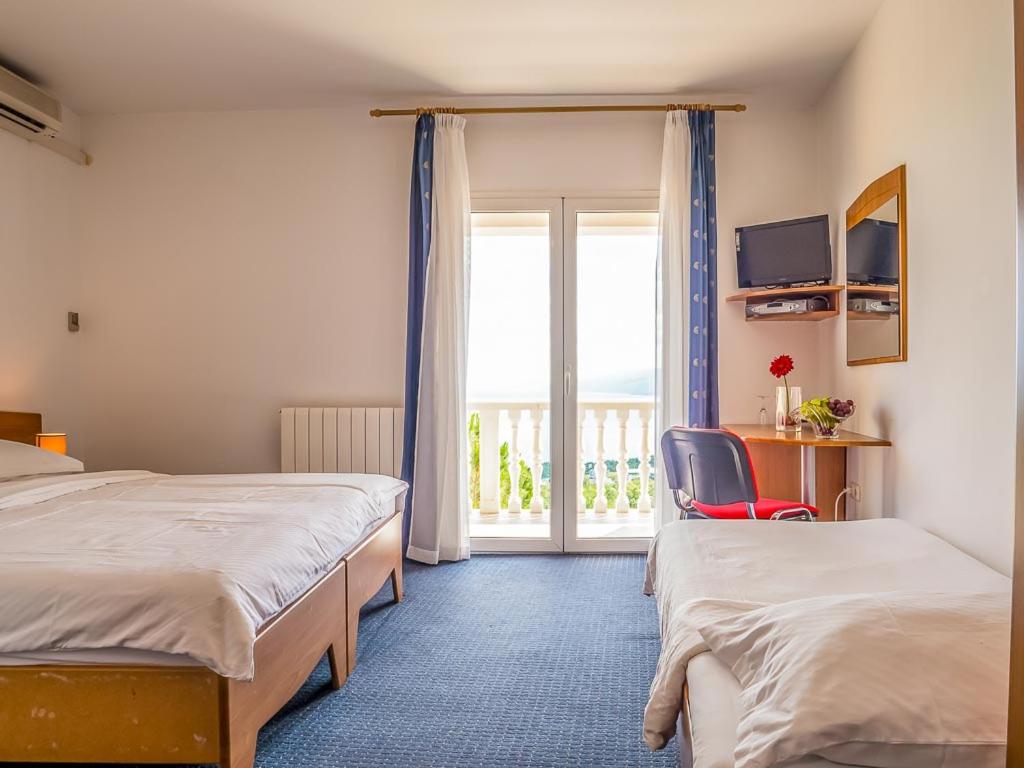 Quadruple Room with Balcony