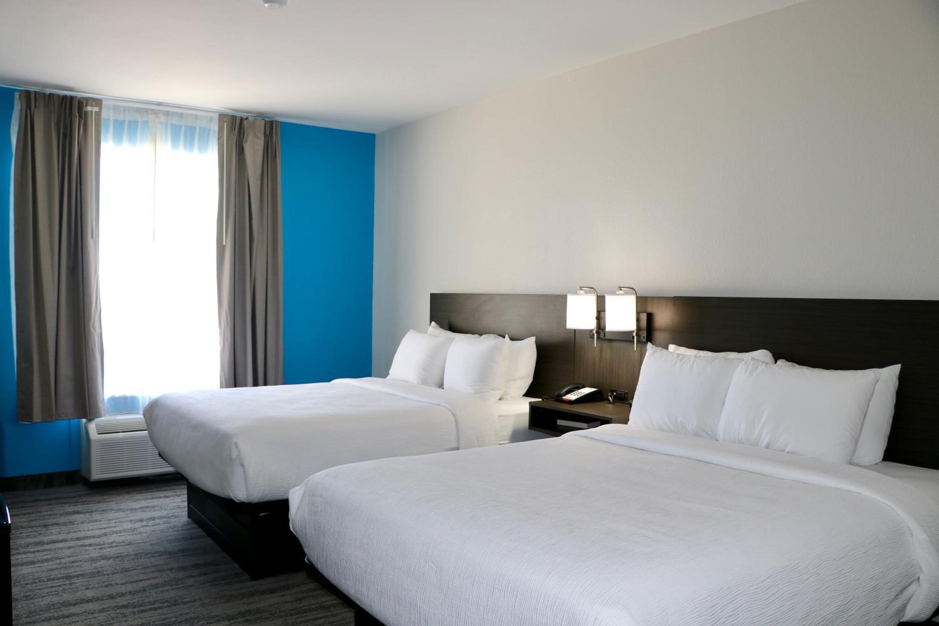Queen Room with Two Queen Beds - Photo 1