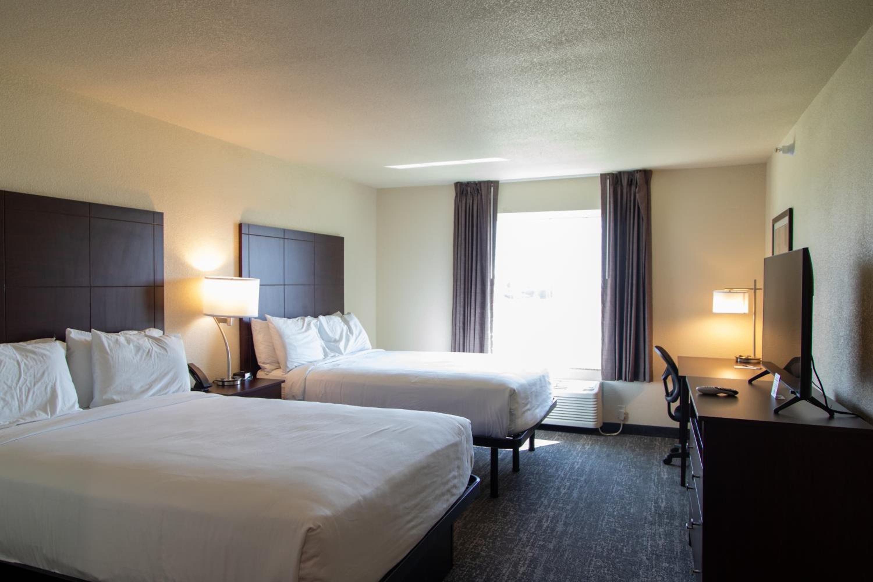 Queen Room with Two Queen Beds - Photo 1