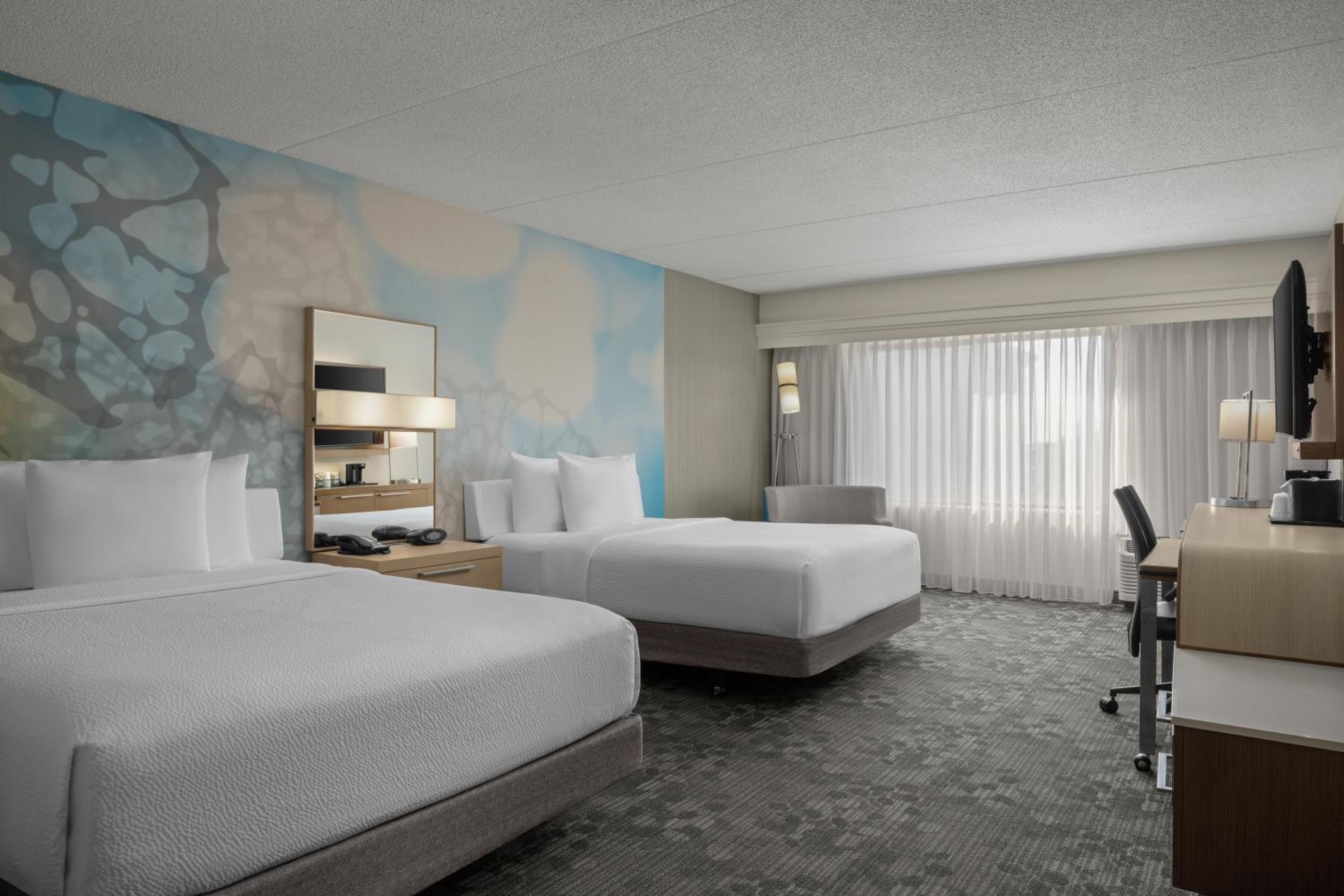 Queen Room with Two Queen Beds - Photo 1