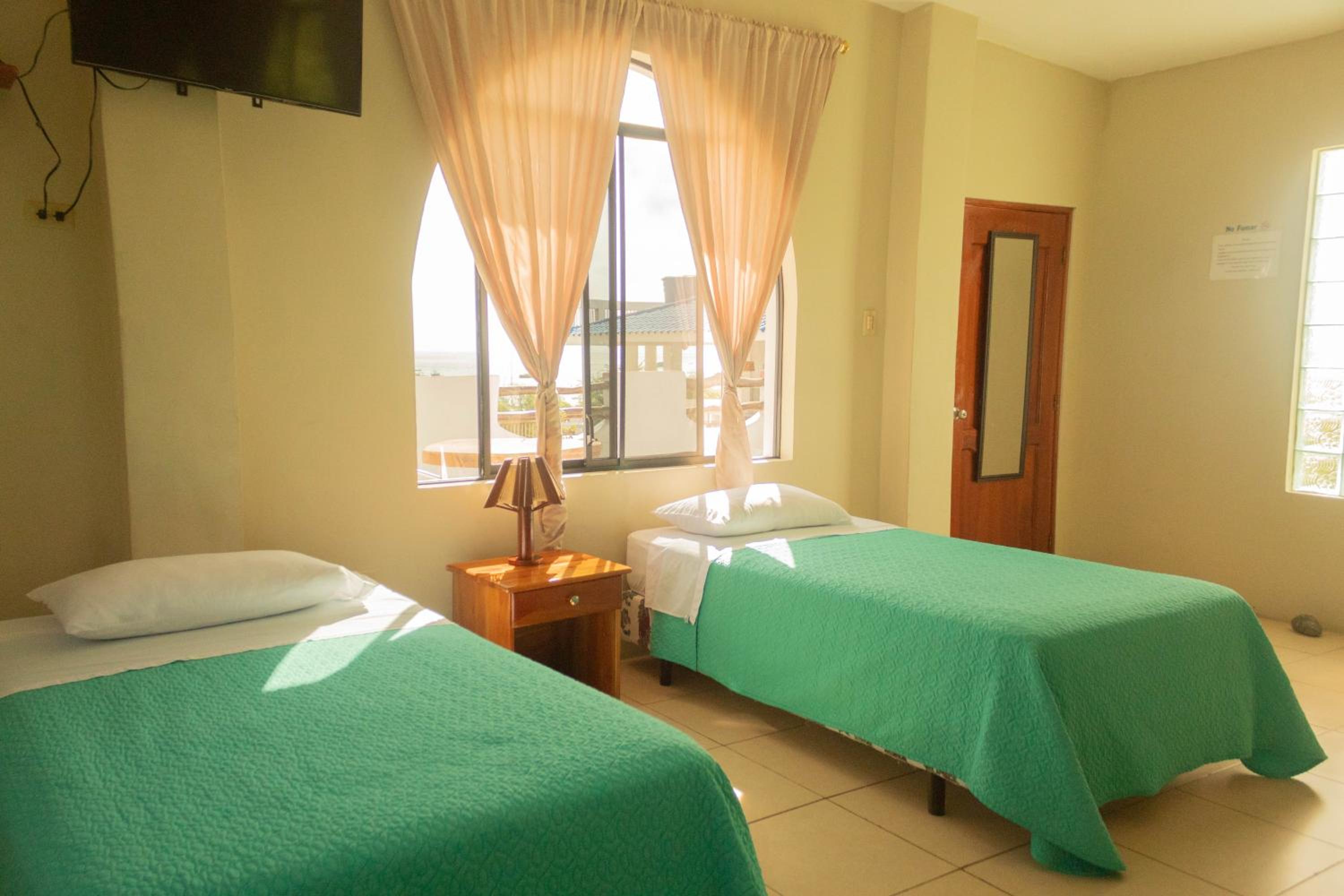 Deluxe Quadruple Room with Balcony