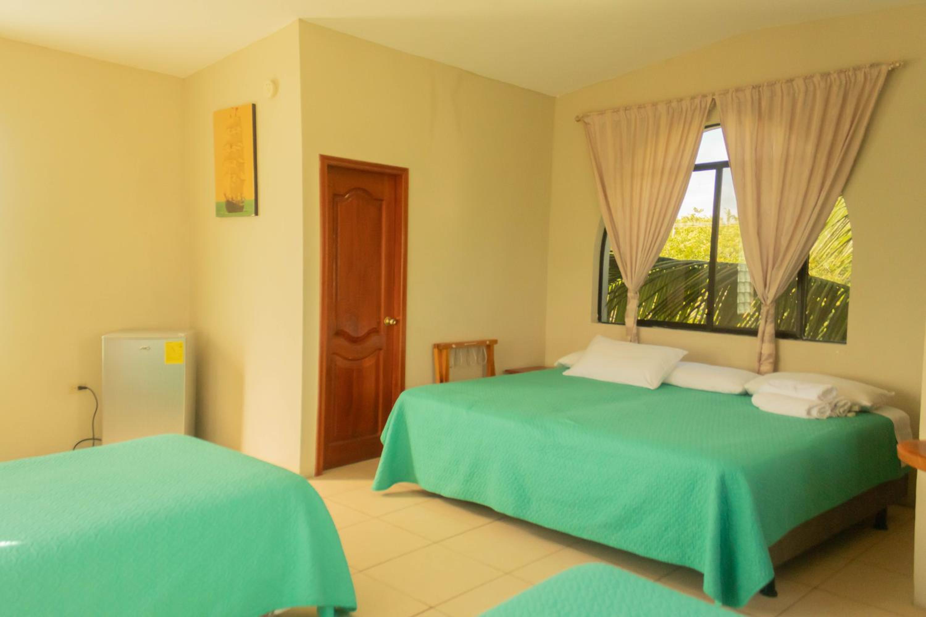 Deluxe Quadruple Room with Balcony photo 2
