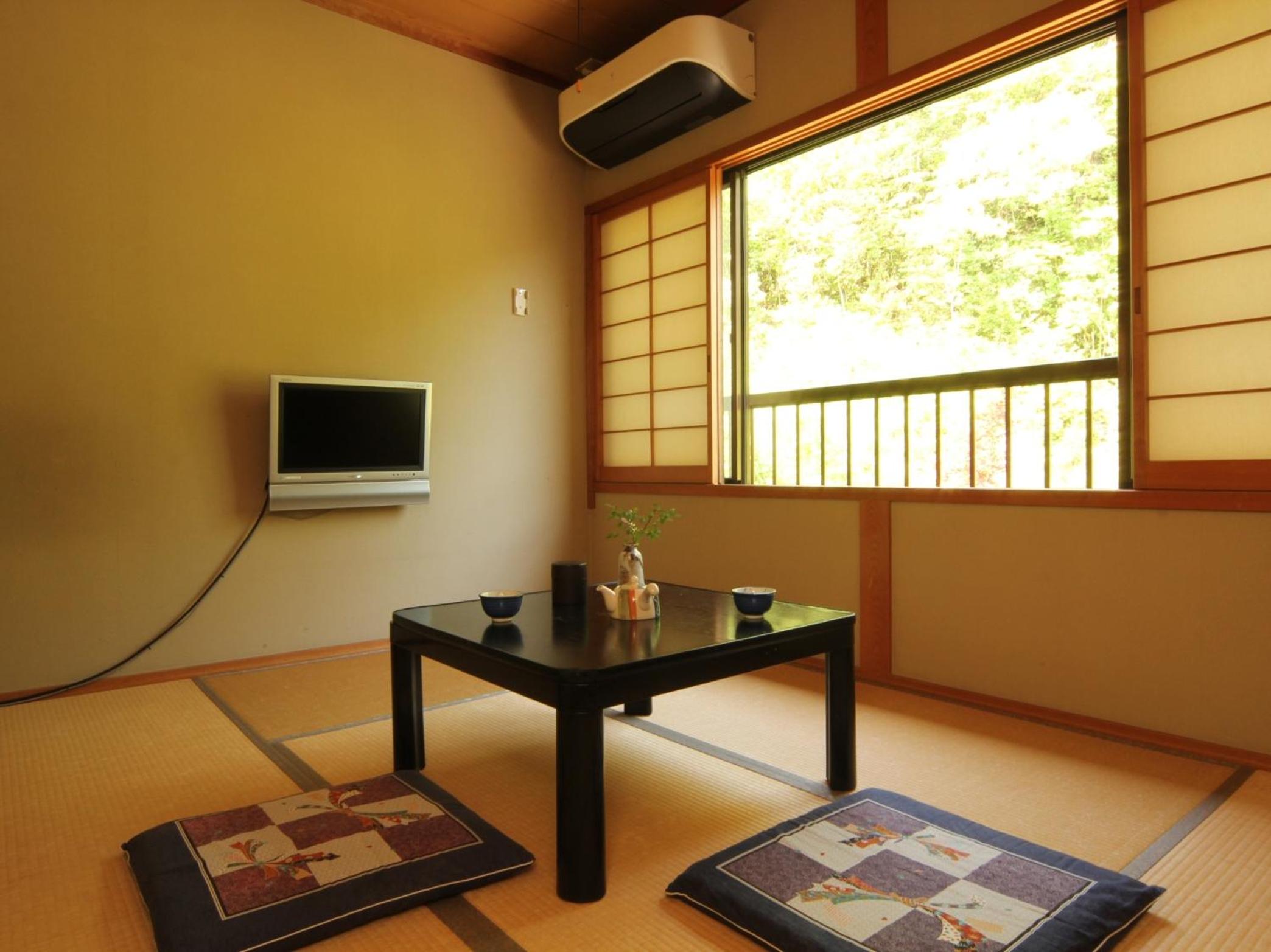 Triple Room - Photo 1